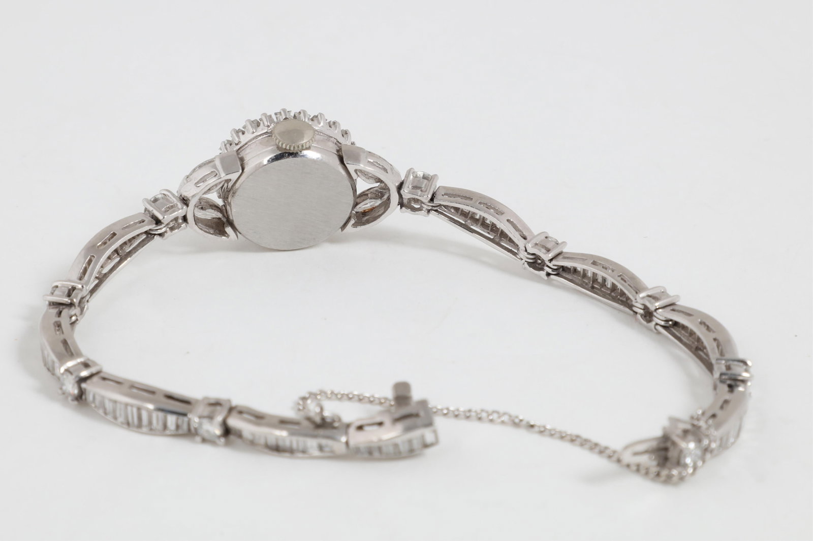 Buhre: A diamond and platinum wristwatch, circa 1950,length 6 5/8in (17cm) - 4