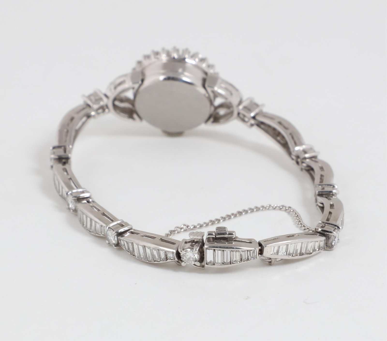 Buhre: A diamond and platinum wristwatch, circa 1950,length 6 5/8in (17cm) - 6