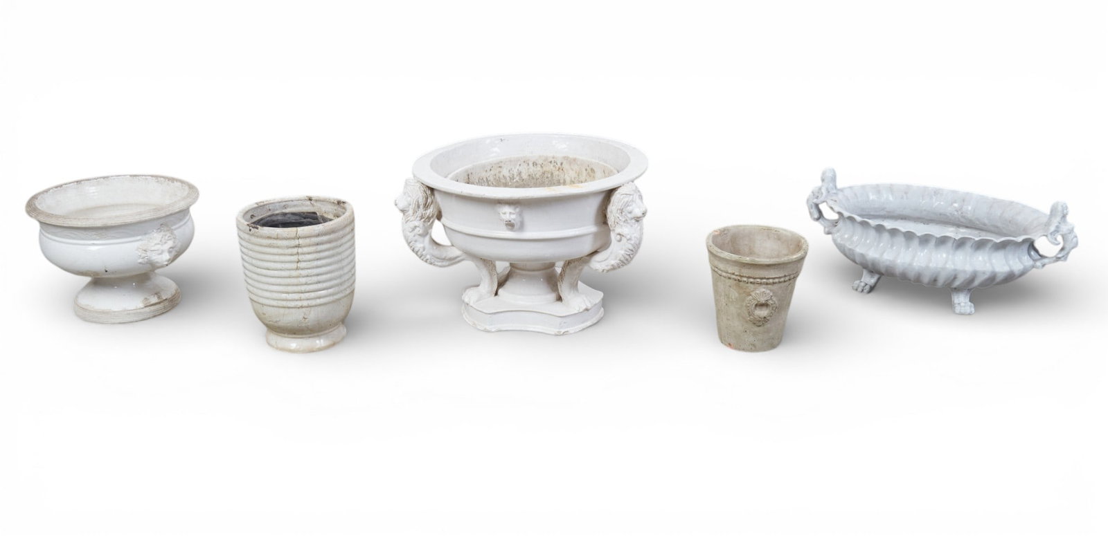 A group of five glazed earthenware jardinieres, 20th century: A group of five glazed earthenware jardinieres 20th century largest height 13in (33cm); diameter 21in (53cm)