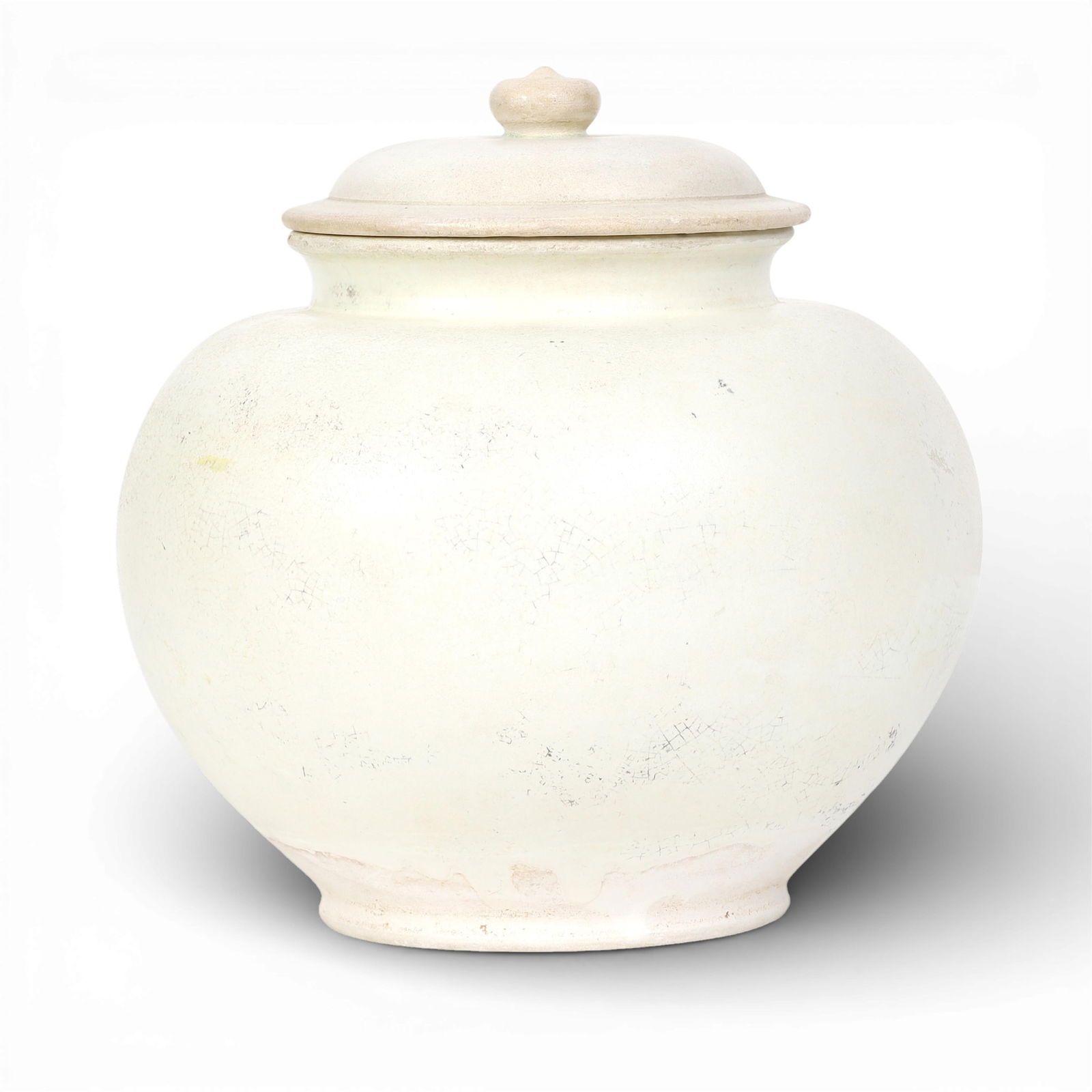 A Chinese xingyao style white glazed lidded pottery jar (1 of 4)