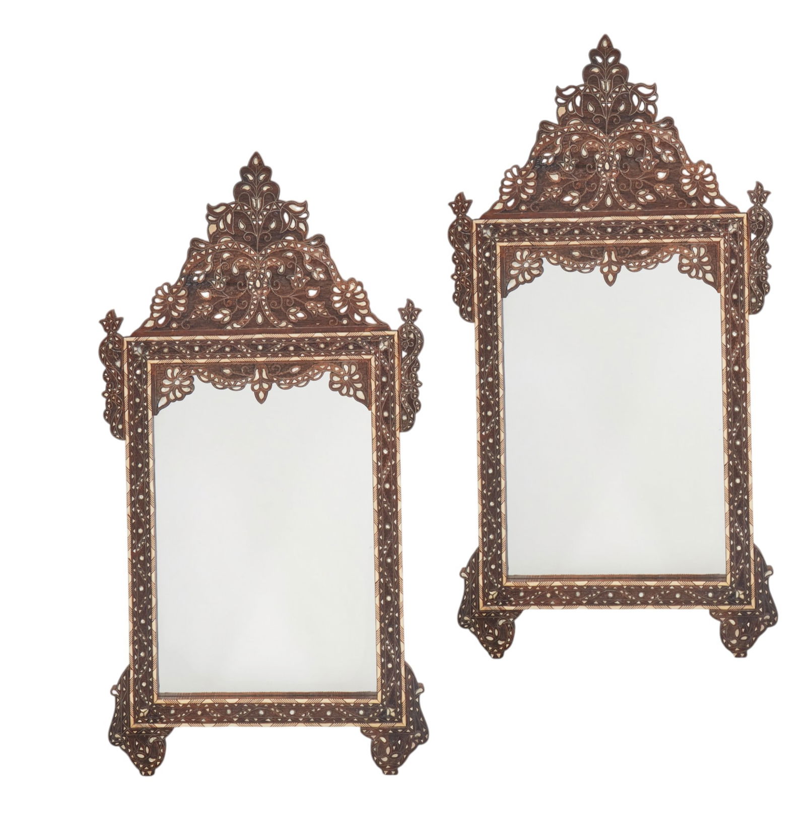A pair of Levantine shell inlaid hardwood mirrors, modern: A pair of Levantine shell inlaid hardwood mirrors modern height 63 1/4in (161cm); width 32 1/2in (83cm)