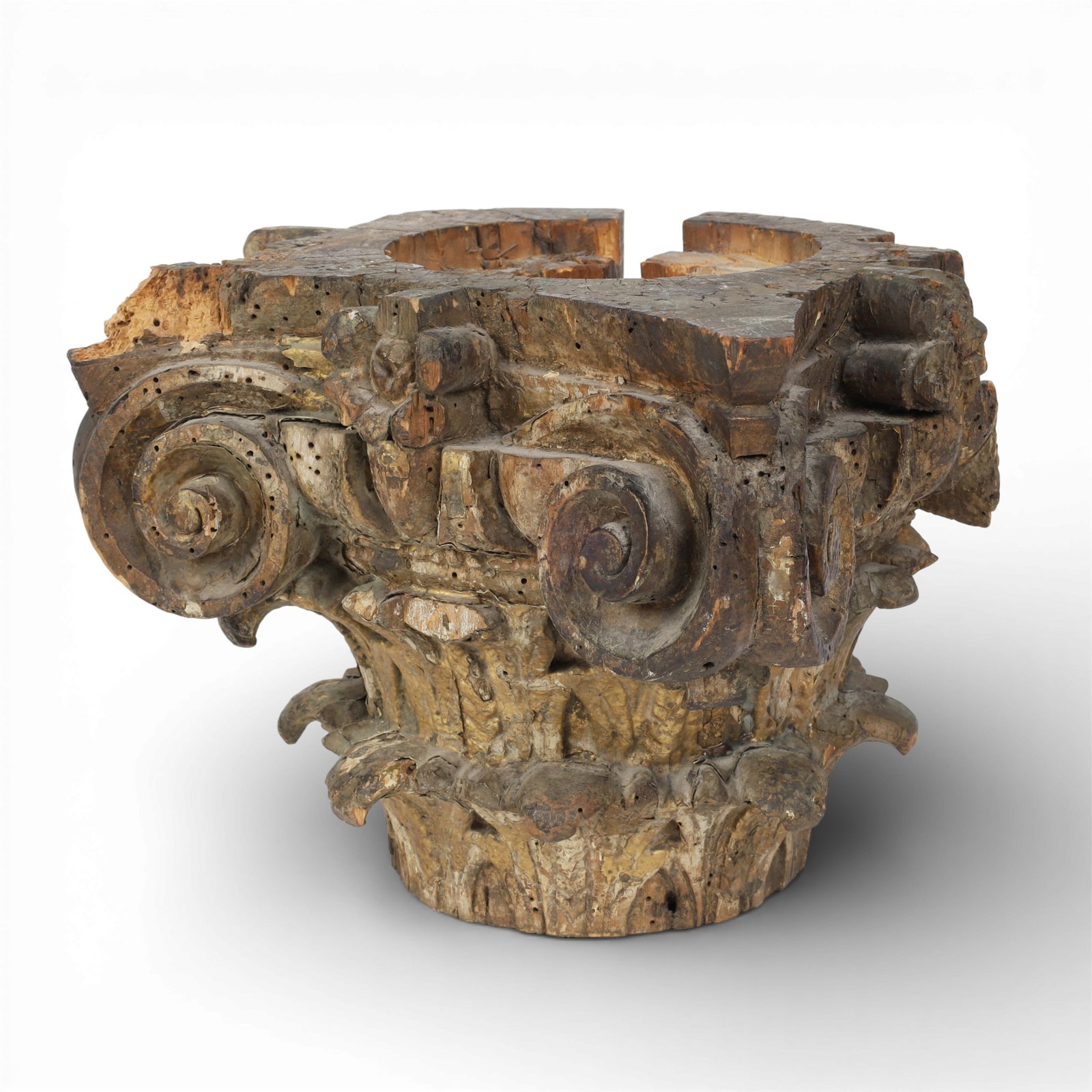 An Italian Baroque giltwood Corinthian capital, 16th century: An Italian Baroque giltwood Corinthian capital 16th century height 8in (20cm); width 9 1/2in (24cm); depth 8in (20cm) Provenance: By repute, with Blackman Cruz, Los Angeles, CA. Property from a