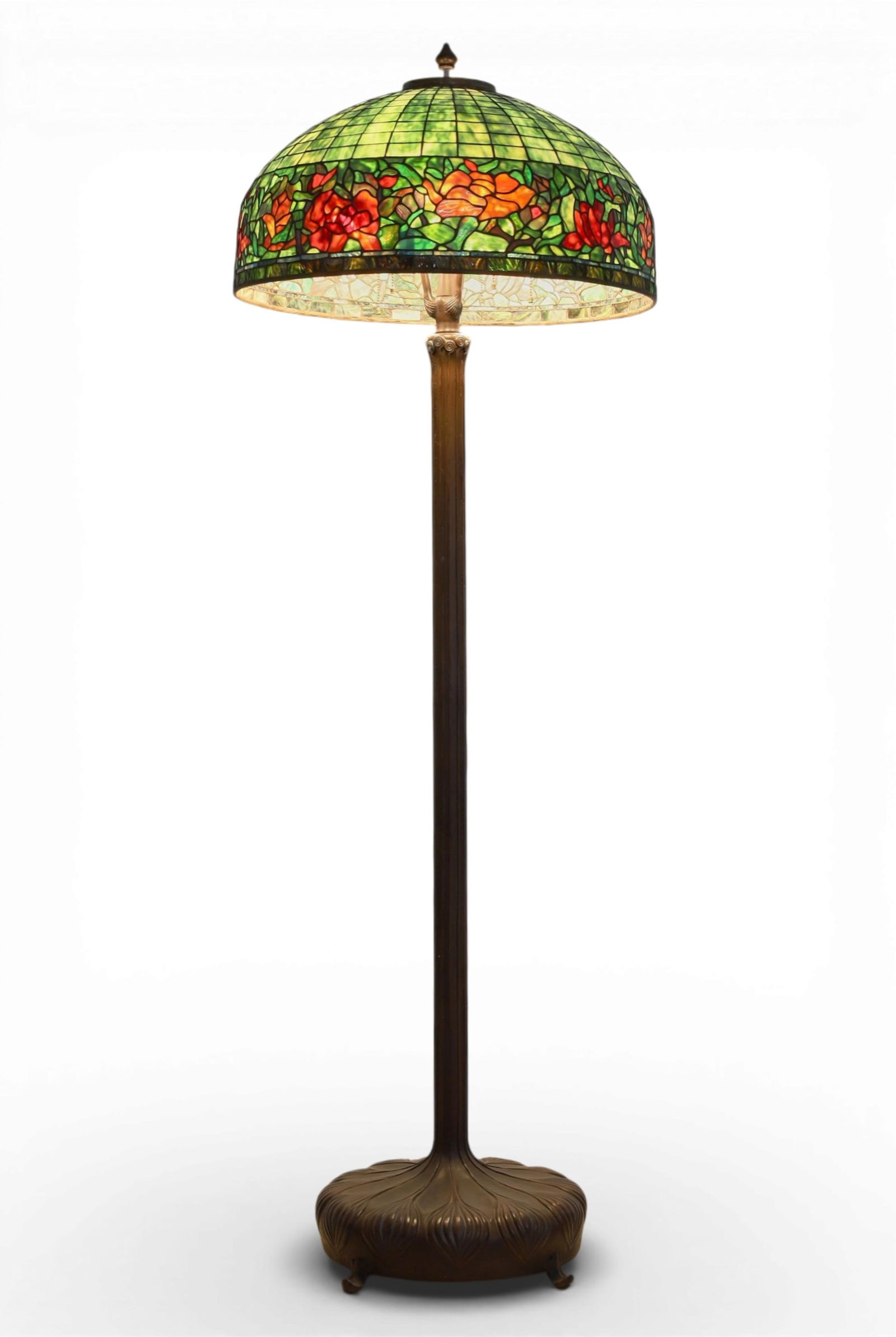 A large Arts & Crafts style leaded slag glass peony border lamp shade on associated base: A large Arts & Crafts style leaded slag glass peony border lamp shade on associated patinated metal Senior basemodernThe shade after the design by Clara Wolcott Driscoll (American, 1861?1944) for Tiff