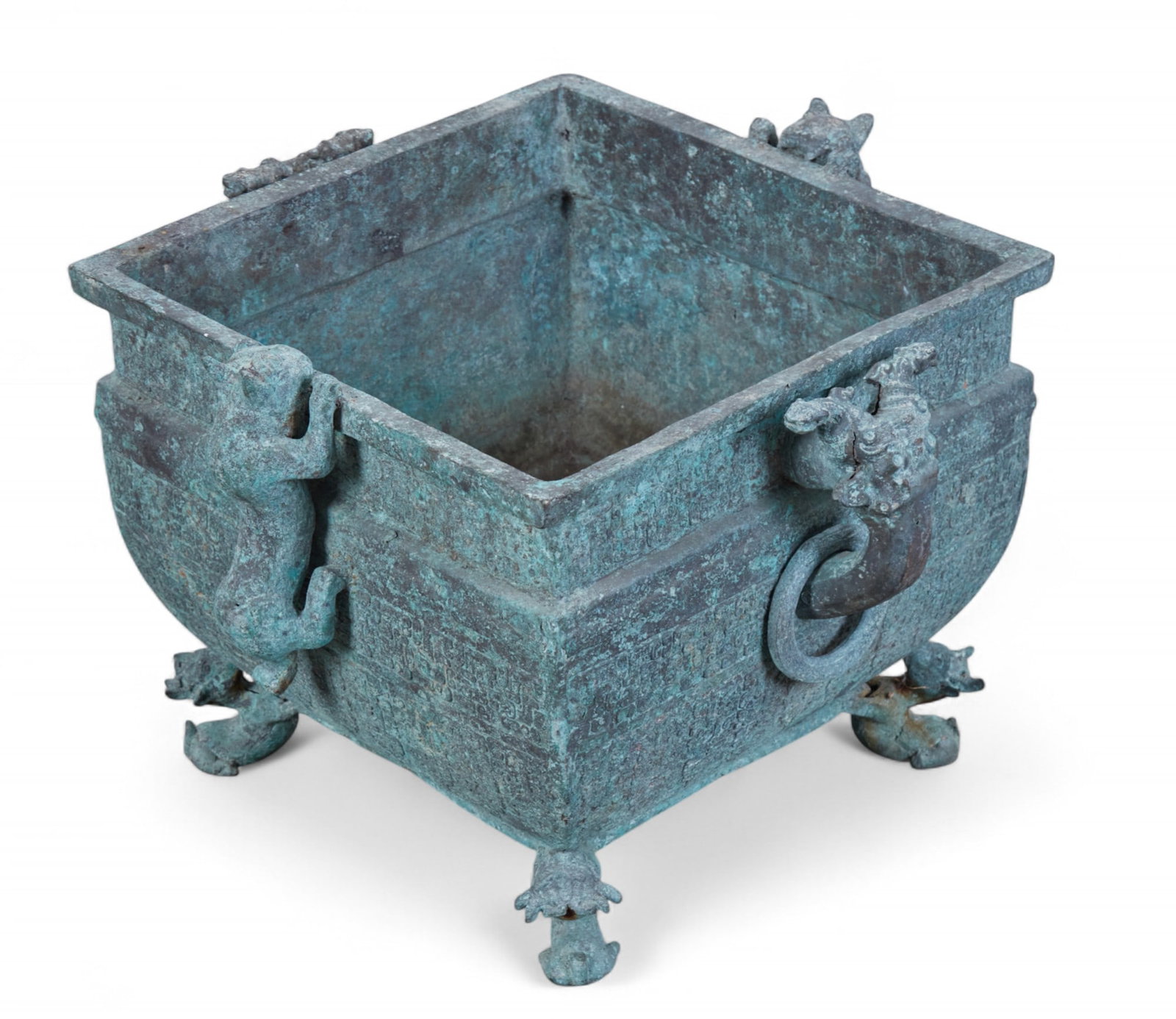 A Chinese Archaistic style bronze jardiniere: A Chinese Archaistic style bronze jardiniereheight 17 1/4in (44cm); width over handles 26 1/2in (67.5cm); depth 24 1/2in (62cm)