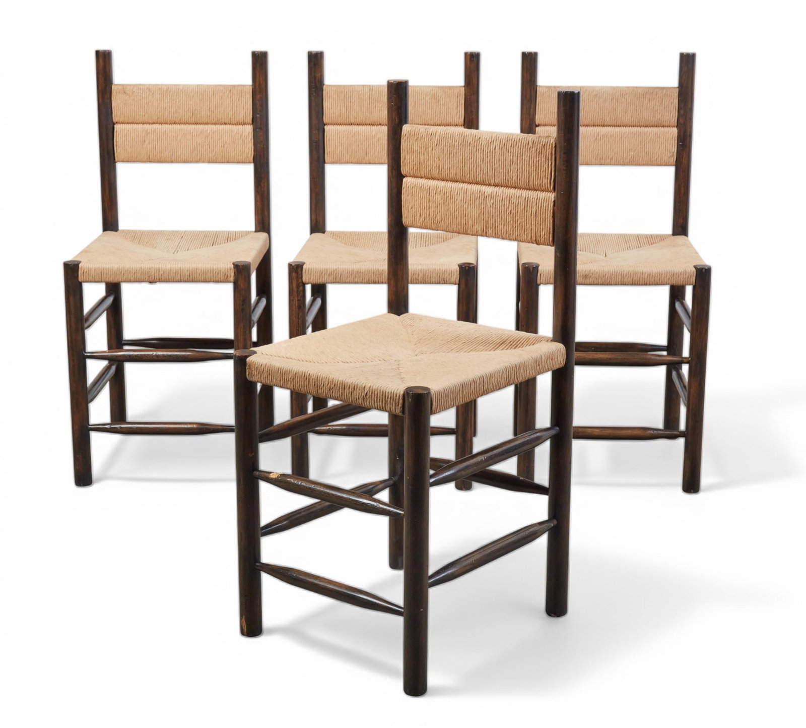 A set of four stained wood and woven rush high chairs, in the manner of Charlotte Perriand (1 of 9)