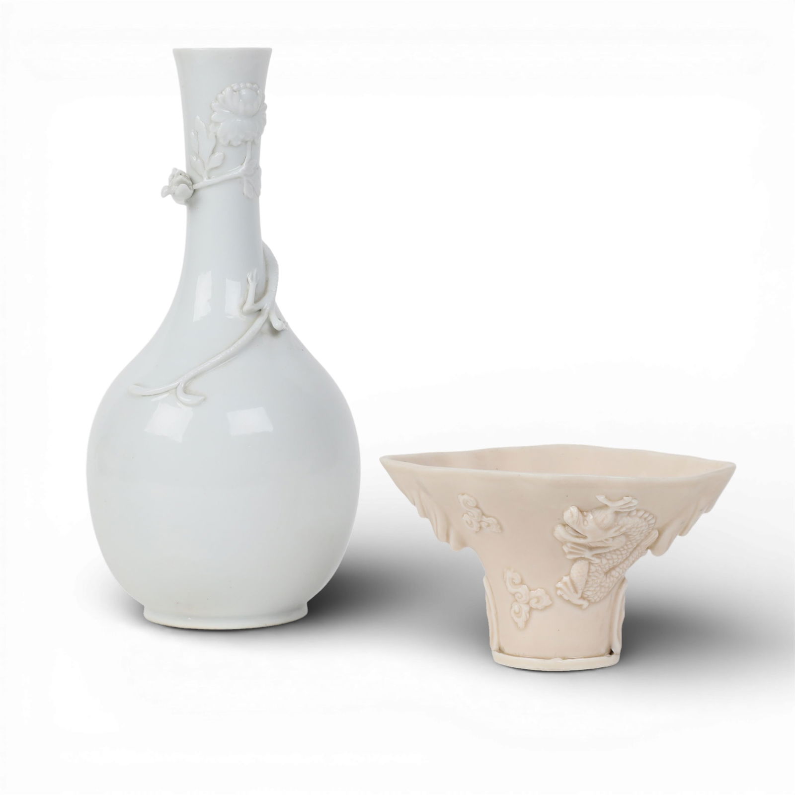 A Chinese dehua stick neck bottle vase with applied Chilong decoration and a libation cup (1 of 4)