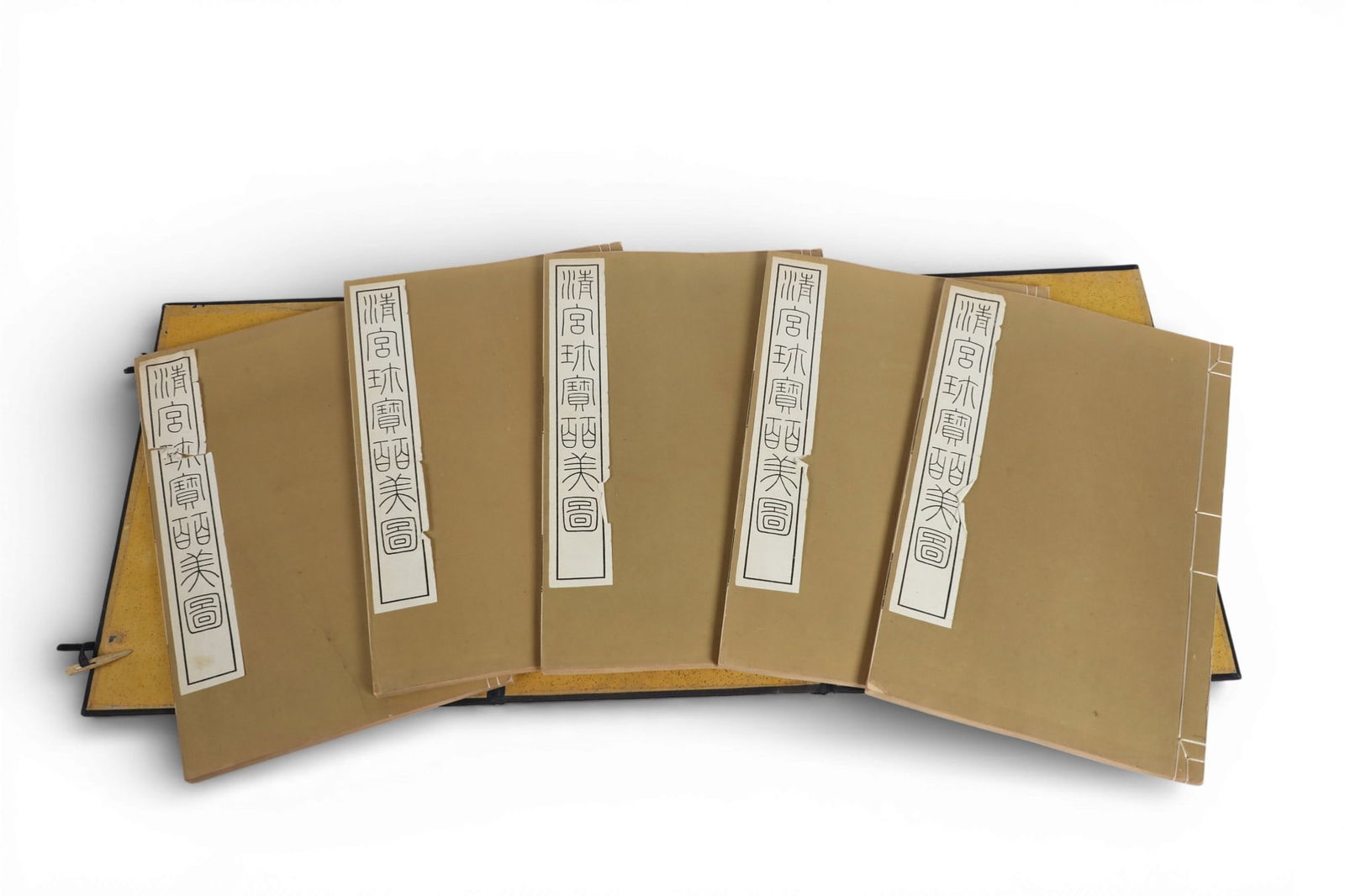 The Plum in the Golden Vase--Chin P'ing Mei: The Plum in the Golden Vase--Chin P'ing Mei lot includes five sewn folio volumes housed in a blue cloth covered clamshell box pertaining to the illustrations for the Chin P'ing Mei in the permanent