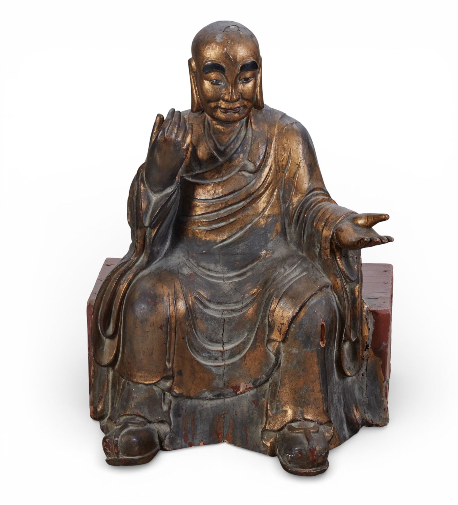 A Japanese gilt lacquered model of a seated Buddha: A Japanese gilt lacquered model of a seated Buddha height 25in (64cm); width 17 1/2in (44cm); depth 14in (36cm)
