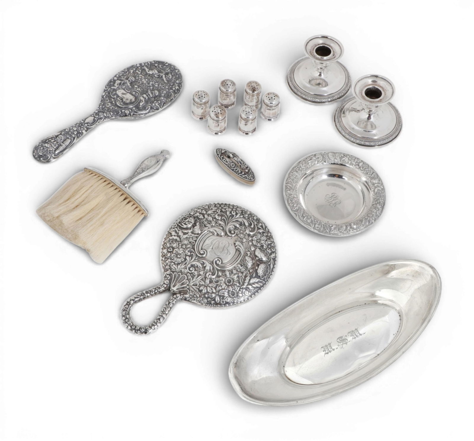 An assembled twelve piece group of American and English sterling silver table and vanity articles (1 of 12)