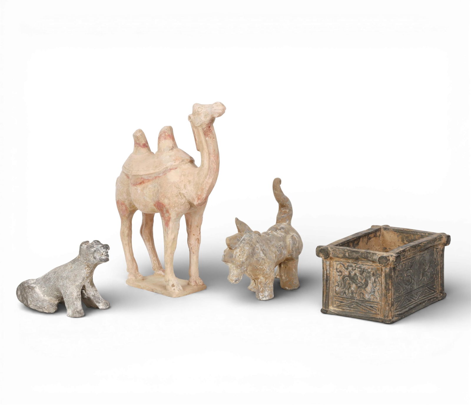 Four Chinese pottery models of animals and a wellhead: Four Chinese pottery models of animals and a wellheadlargest height 14 3/4in (37cm); length 12in (31cm); width 5in (13cm) Provenance:Property from the Preiser Collection.