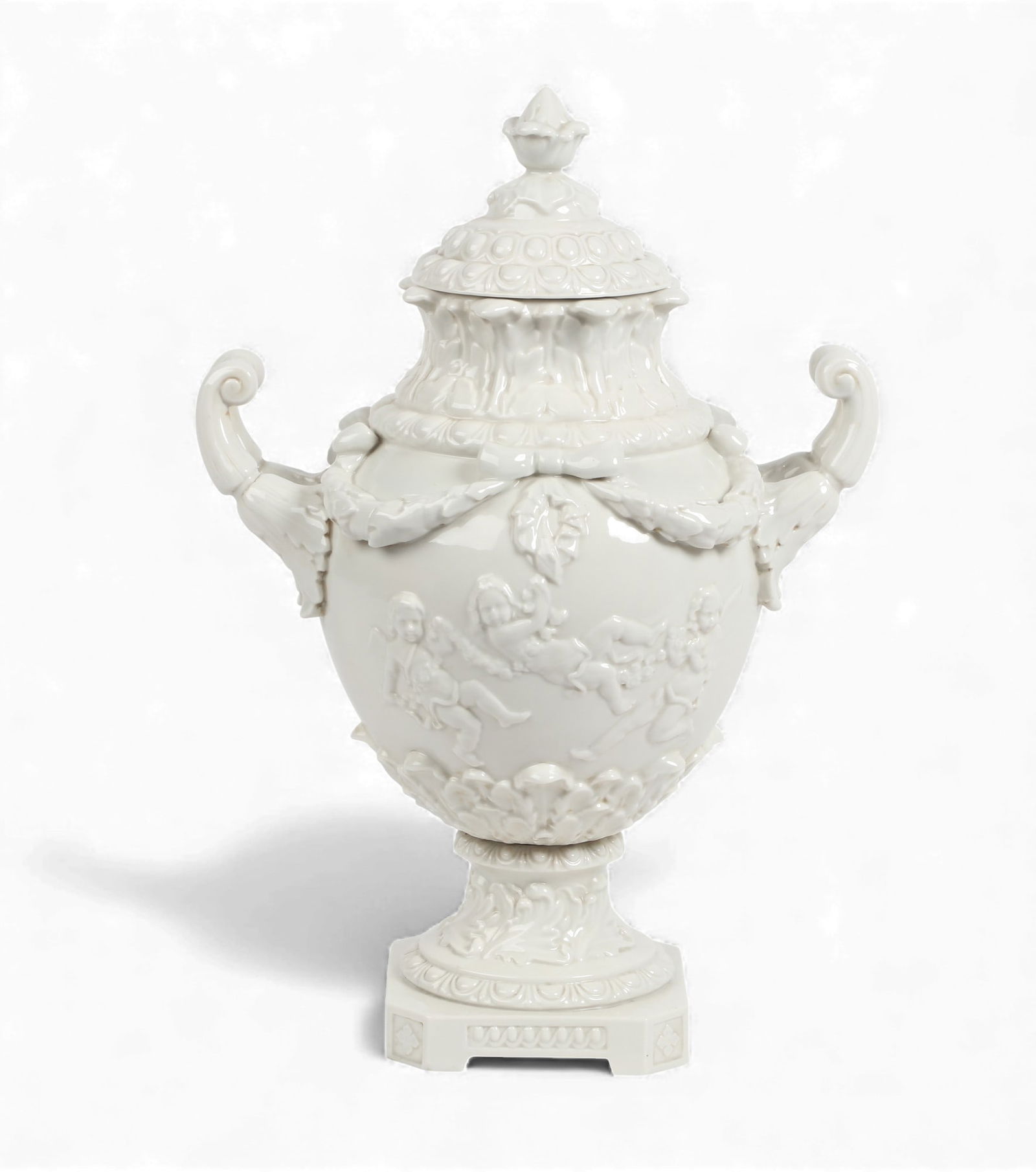 A Continental Neoclassical style blanc de chine porcelain covered vase, 20th century: A Continental Neoclassical style blanc de chine porcelain covered vase20th centuryheight 20 1/2in (52cm); width 14in (35.5cm); depth 9in (23cm) Provenance:Property from the Collection of Sophia Hutch
