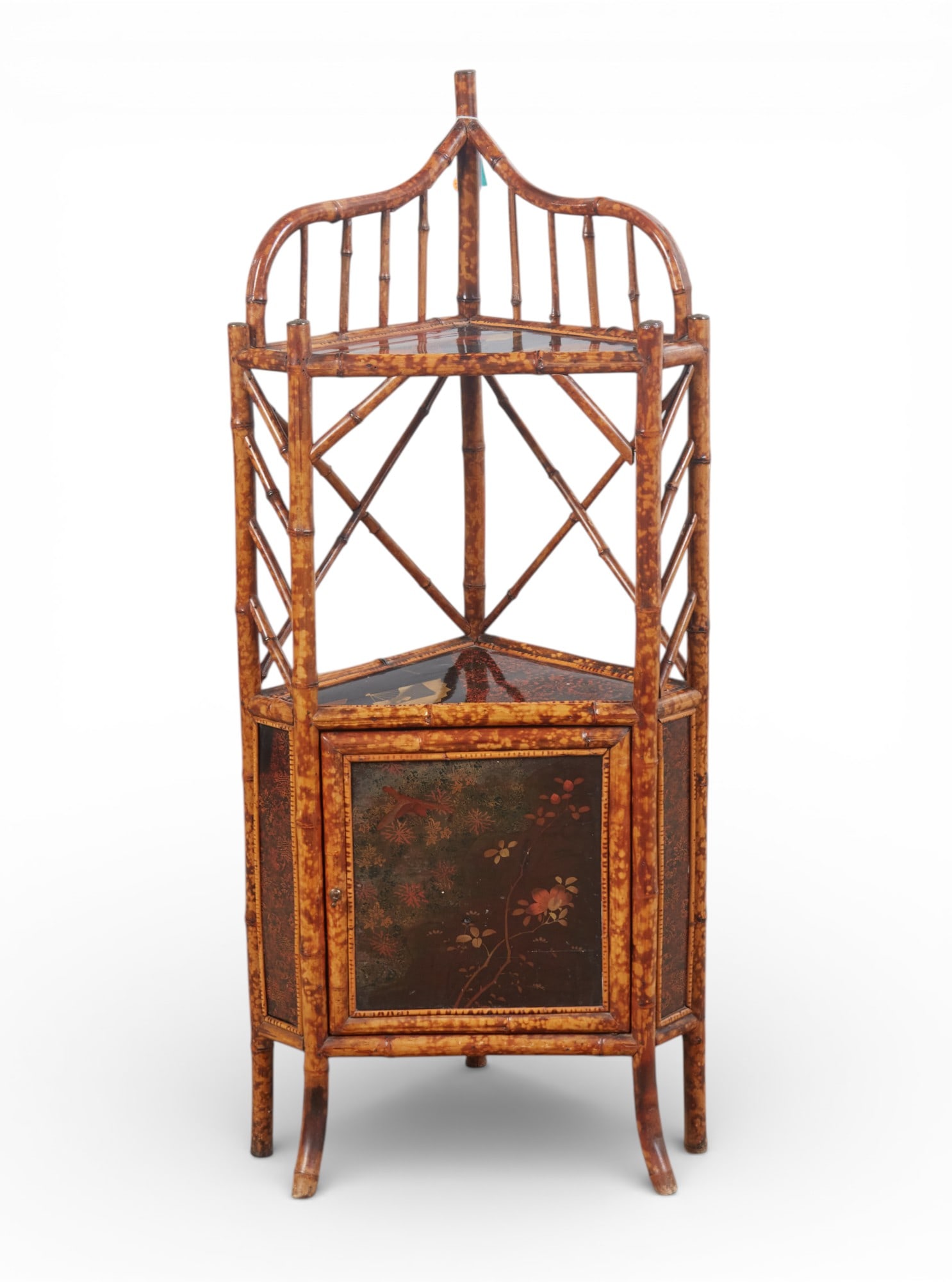 An Aesthetic Movement bamboo and lacquer corner stand, mid-19th century: An Aesthetic Movement bamboo and lacquer corner stand mid-19th century height 56in (142cm); width 23 1/2in (60cm); depth 15 1/2in (39cm)