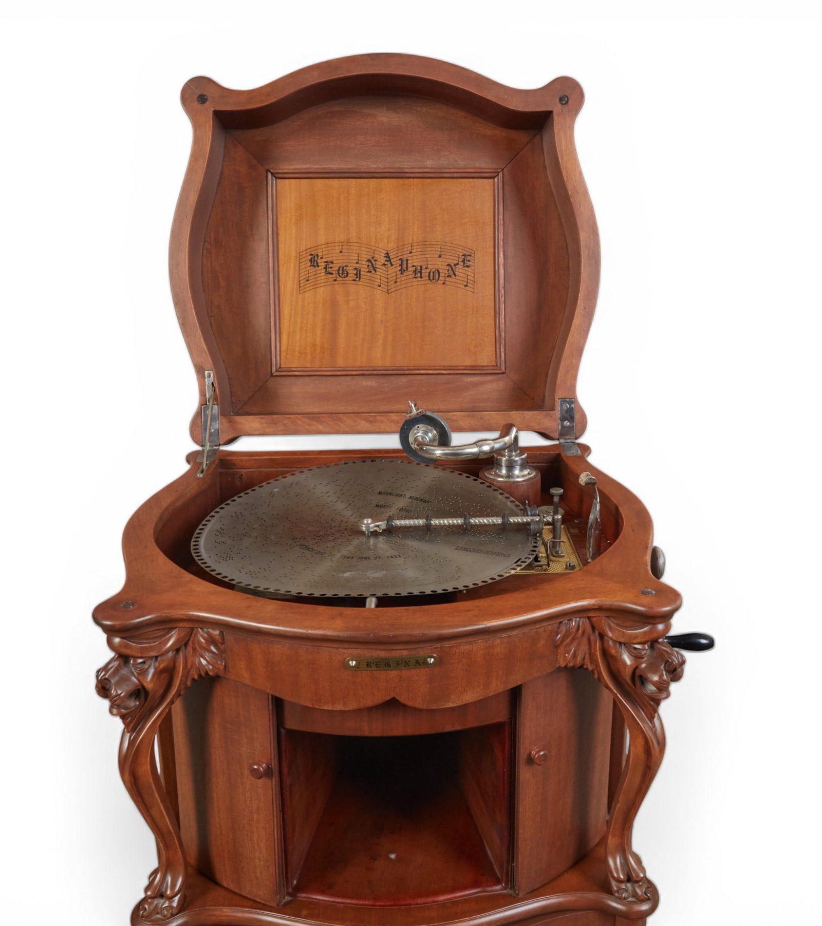 A Reginaphone dual polyphone disc and record player, early 20th century (1 of 12)