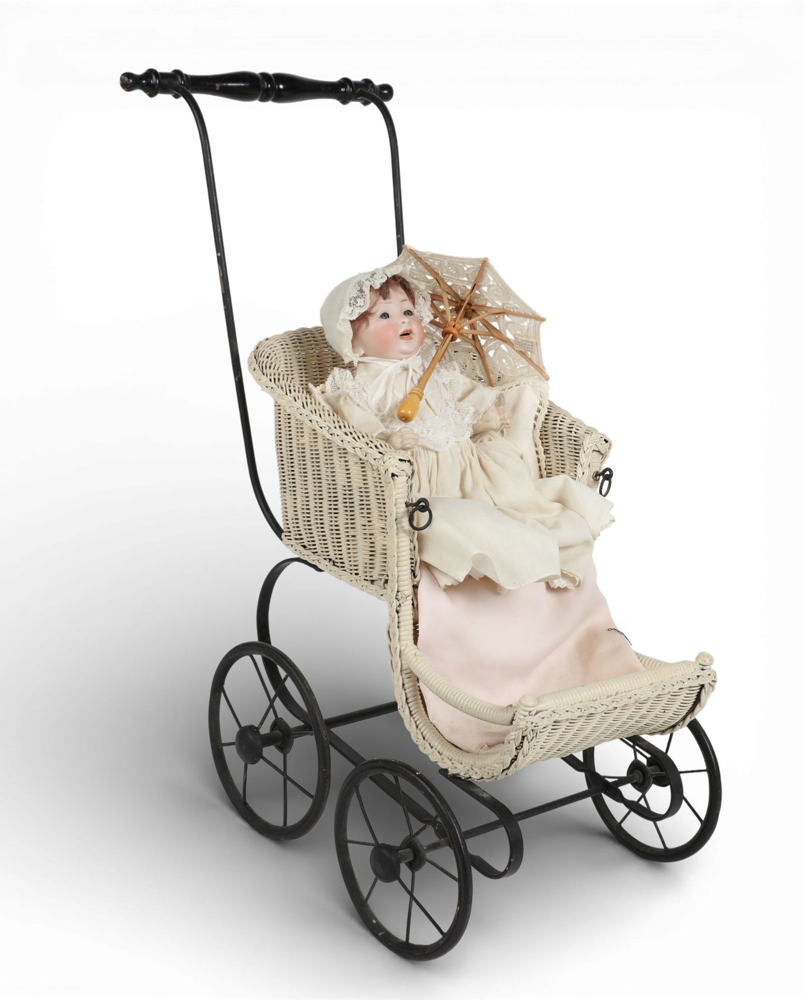 A German bisque head doll and carriage, 20th century (1 of 3)