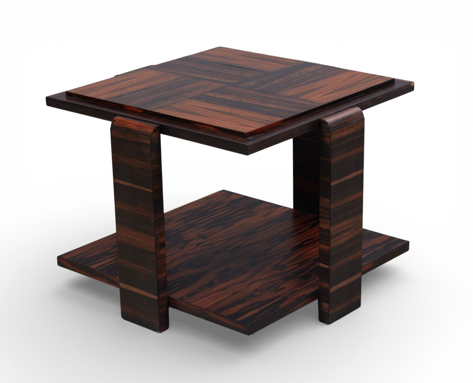 An Art Deco style Macassar ebony side table, second half 20th century: An Art Deco style Macassar ebony side tablesecond half 20th centuryheight 22 1/4in (56cm); width 27in (69cm) square