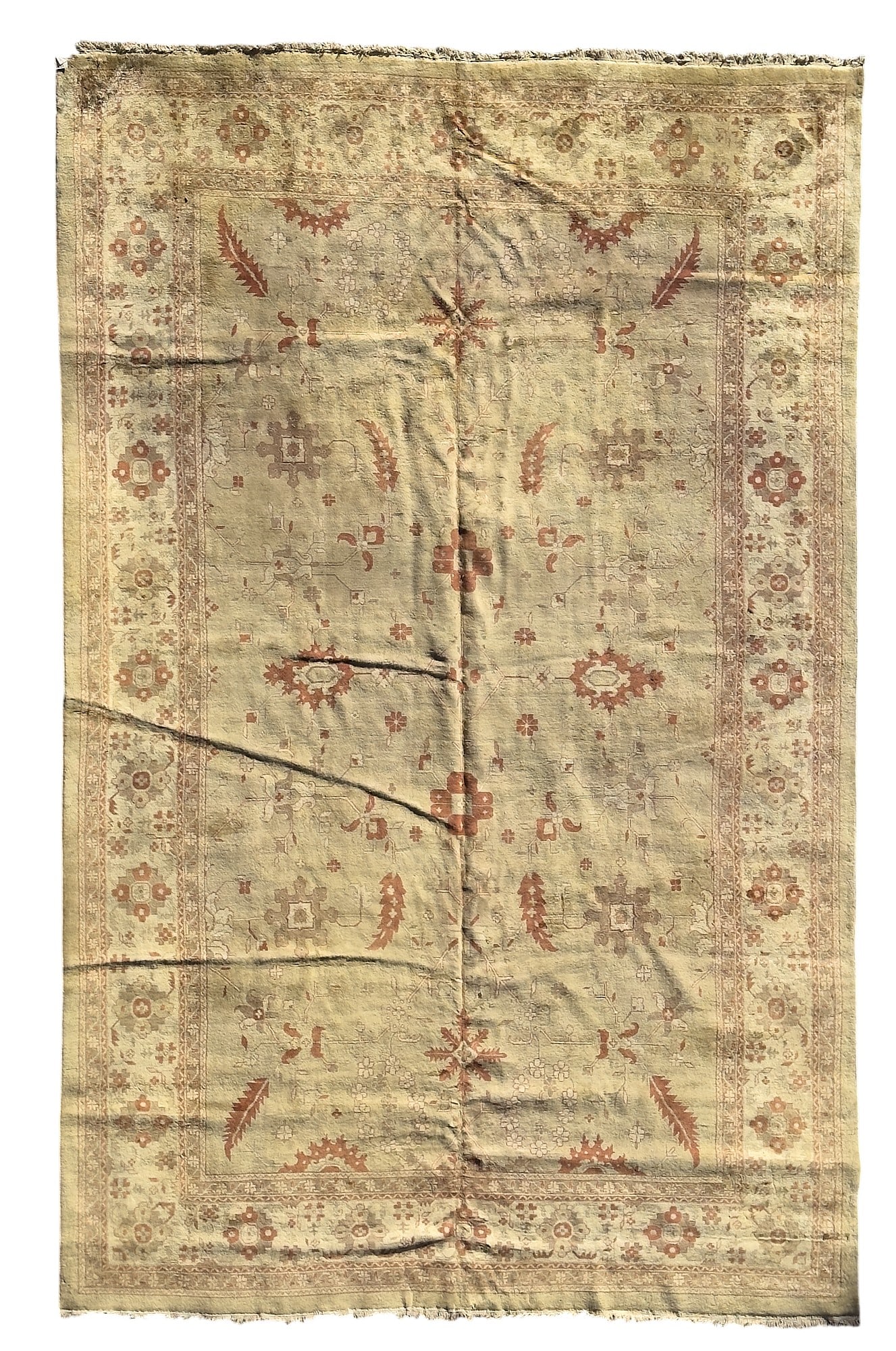 An Oushak style rug: An Oushak style rug approximately 18ft x 11ft 11in ( 550x346cm)