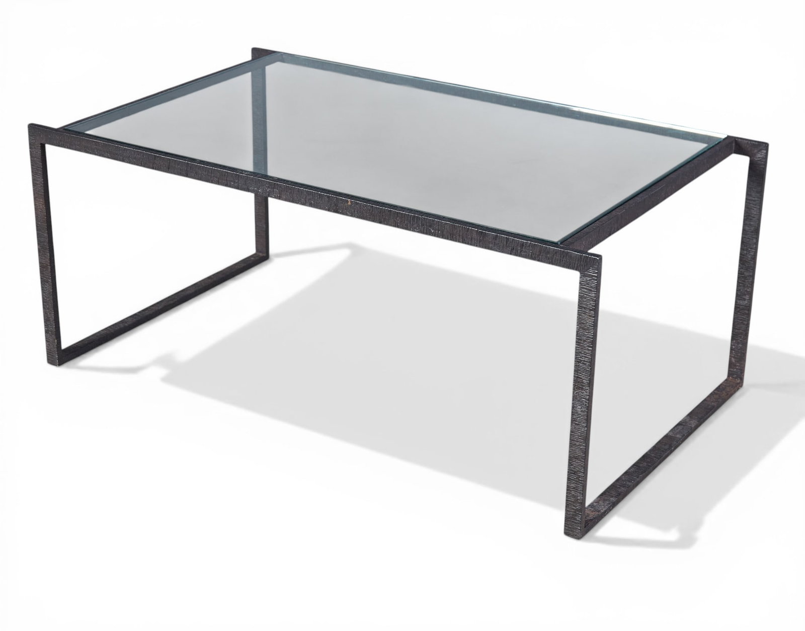 A contemporary iron coffee table with glass top (1 of 6)