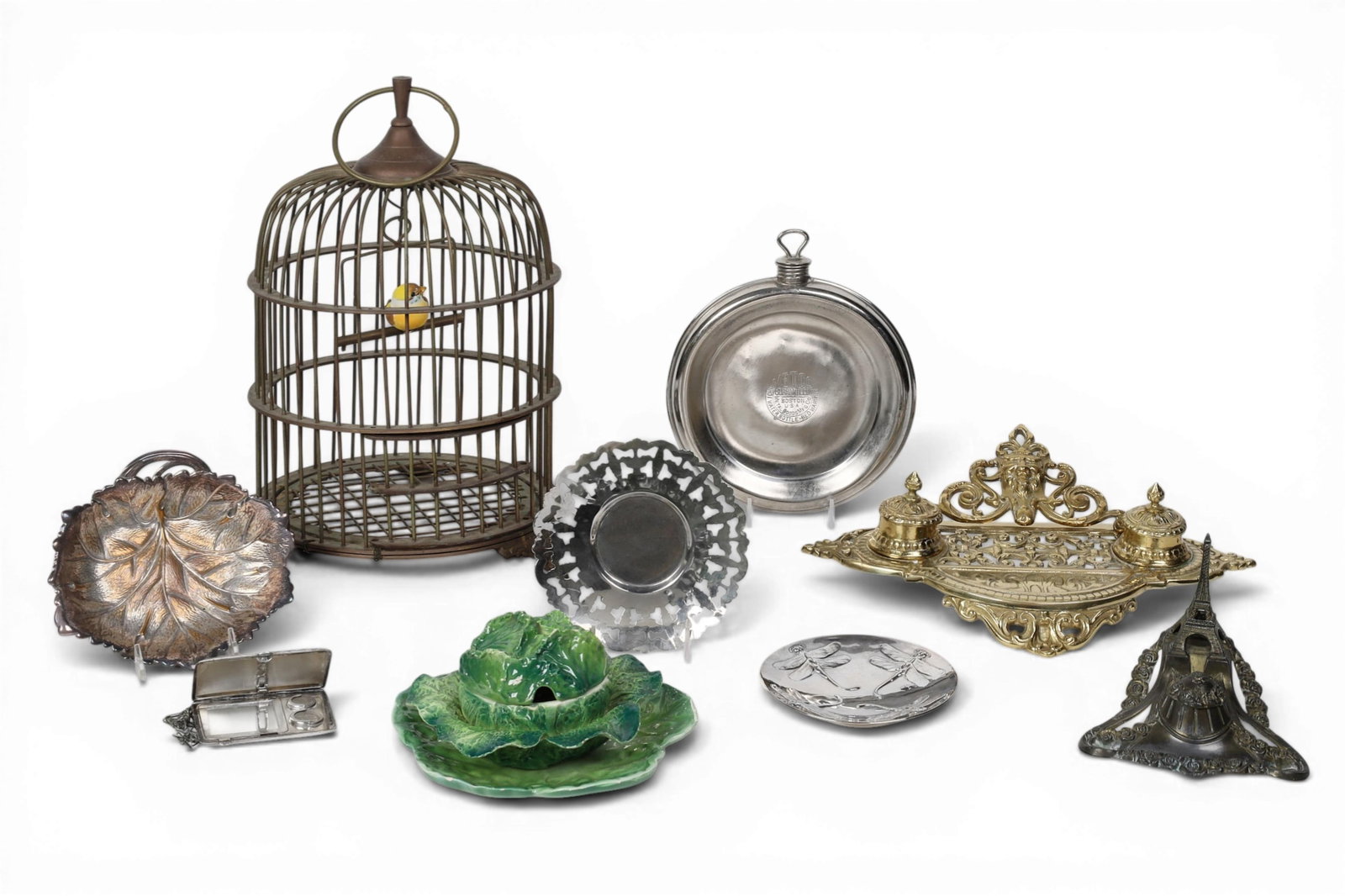 An assembled nine piece group of International mixed media table and vanity articles, 19th-20th: An assembled nine piece group of International mixed media table and vanity articles 19th-20th century larger writing stand height 4in (10cm); width 13 1/2in (34cm); depth 10in (25.5cm)