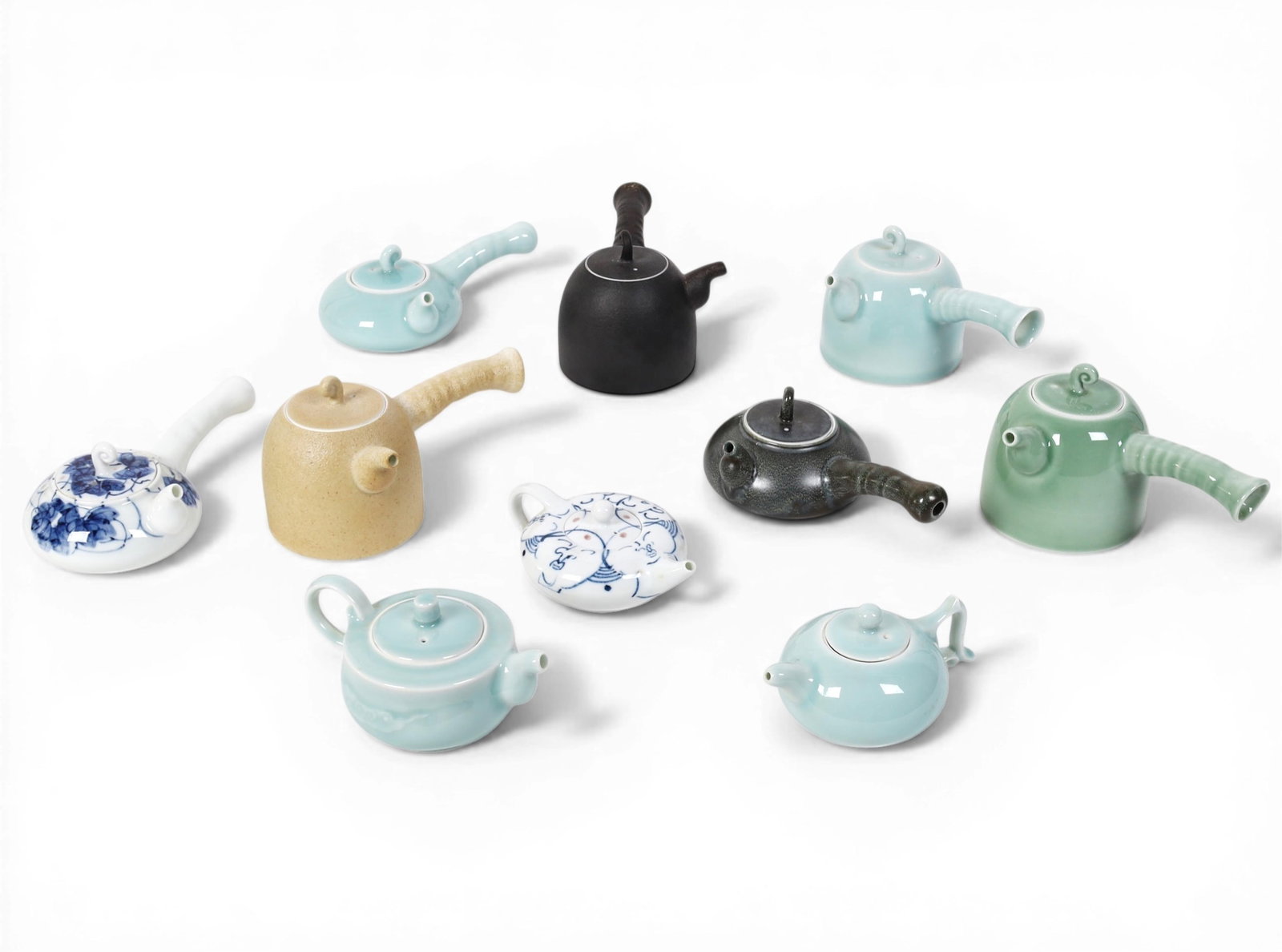 A group of ten Chinese teapots of various sizes (1 of 6)