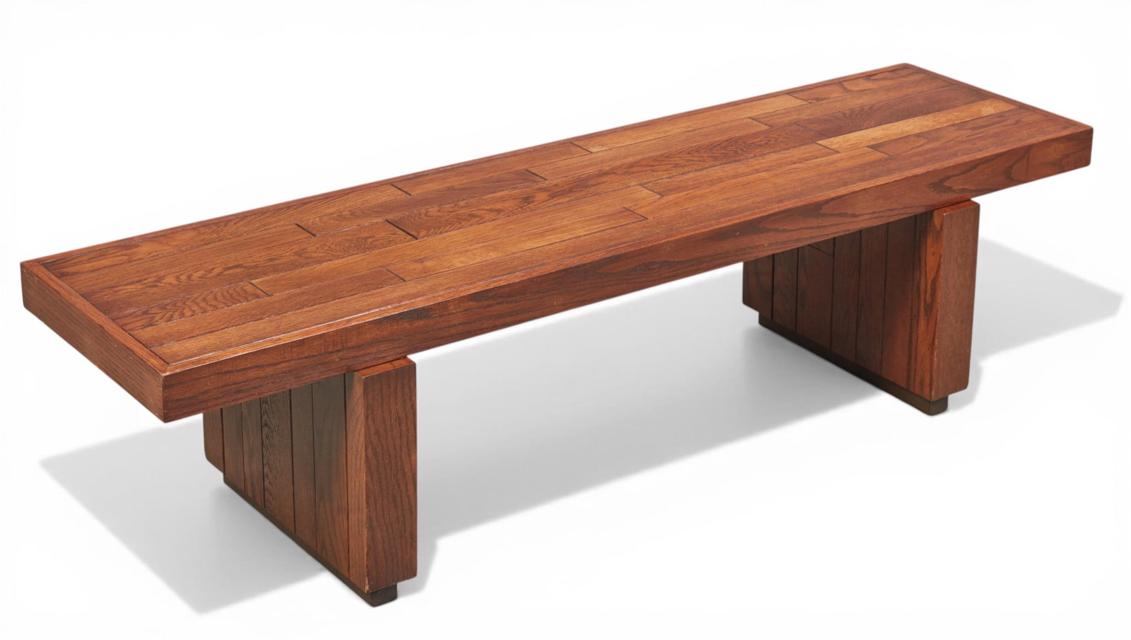 A modern oak bench/table: A modern oak bench/table height 16in (40.5cm); width 60in (152cm); depth 18in (48cm) Provenance: Property from a Private Pasadena Collection.