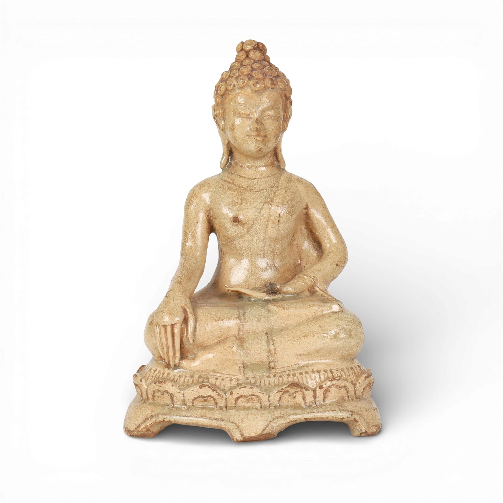 A Southeast Asian glazed ceramic model of seated Buddha: A Southeast Asian glazed ceramic model of seated Buddha height 8 1/4in (21cm); width 5 3/4in (14.5cm); depth 4in (10cm) Provenance: Property from the Preiser Collection.