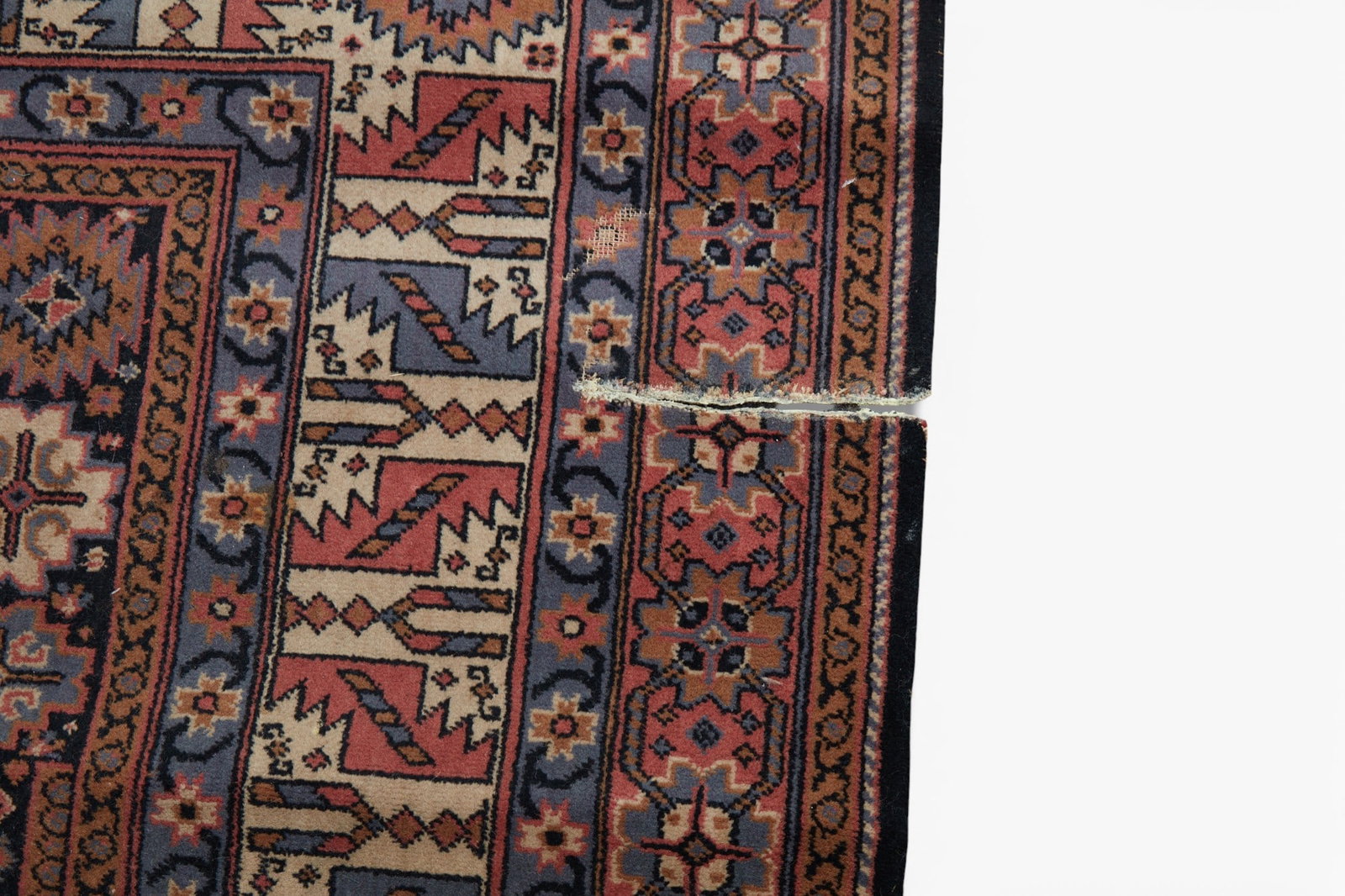 A machine made rug - 4