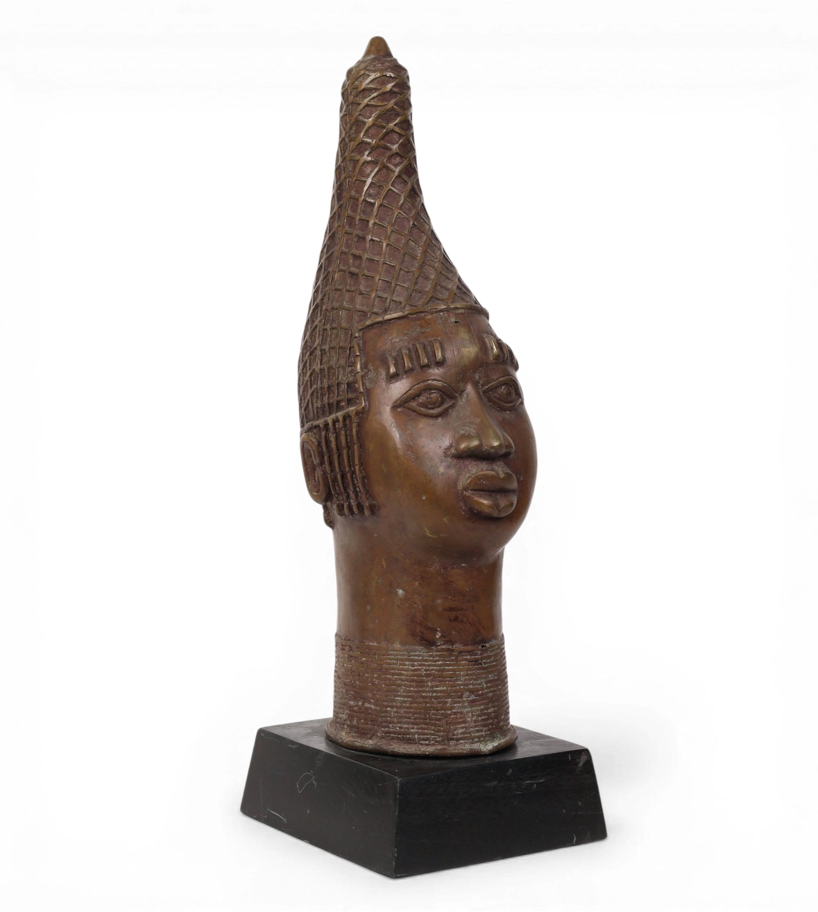 A metal African head of a woman on a wooden base (1 of 4)