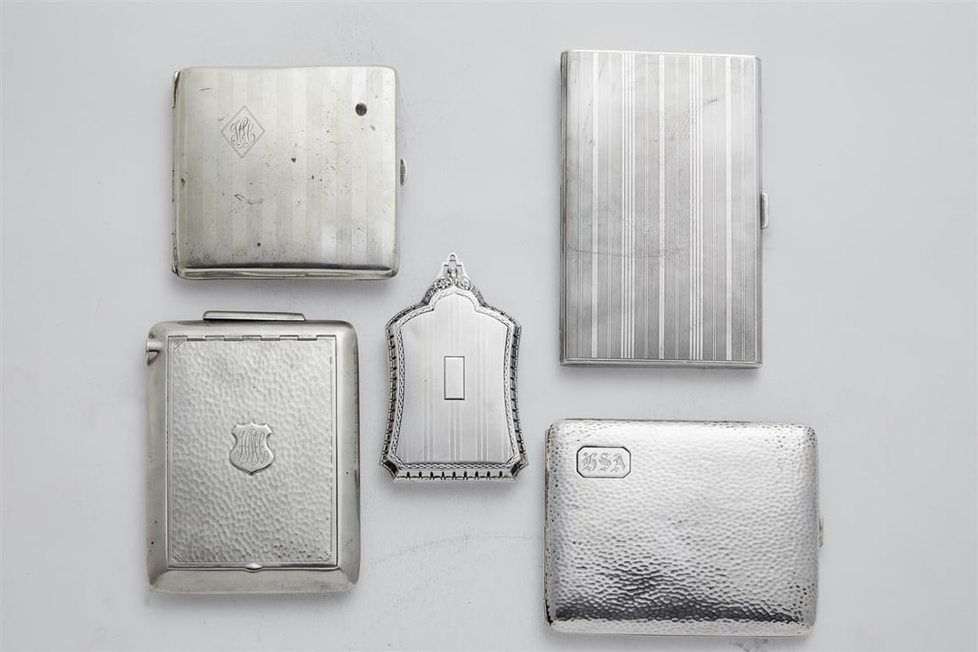 A collection of four silverplated cigarette cases and a sterling compact various makers early 20th (1 of 9)