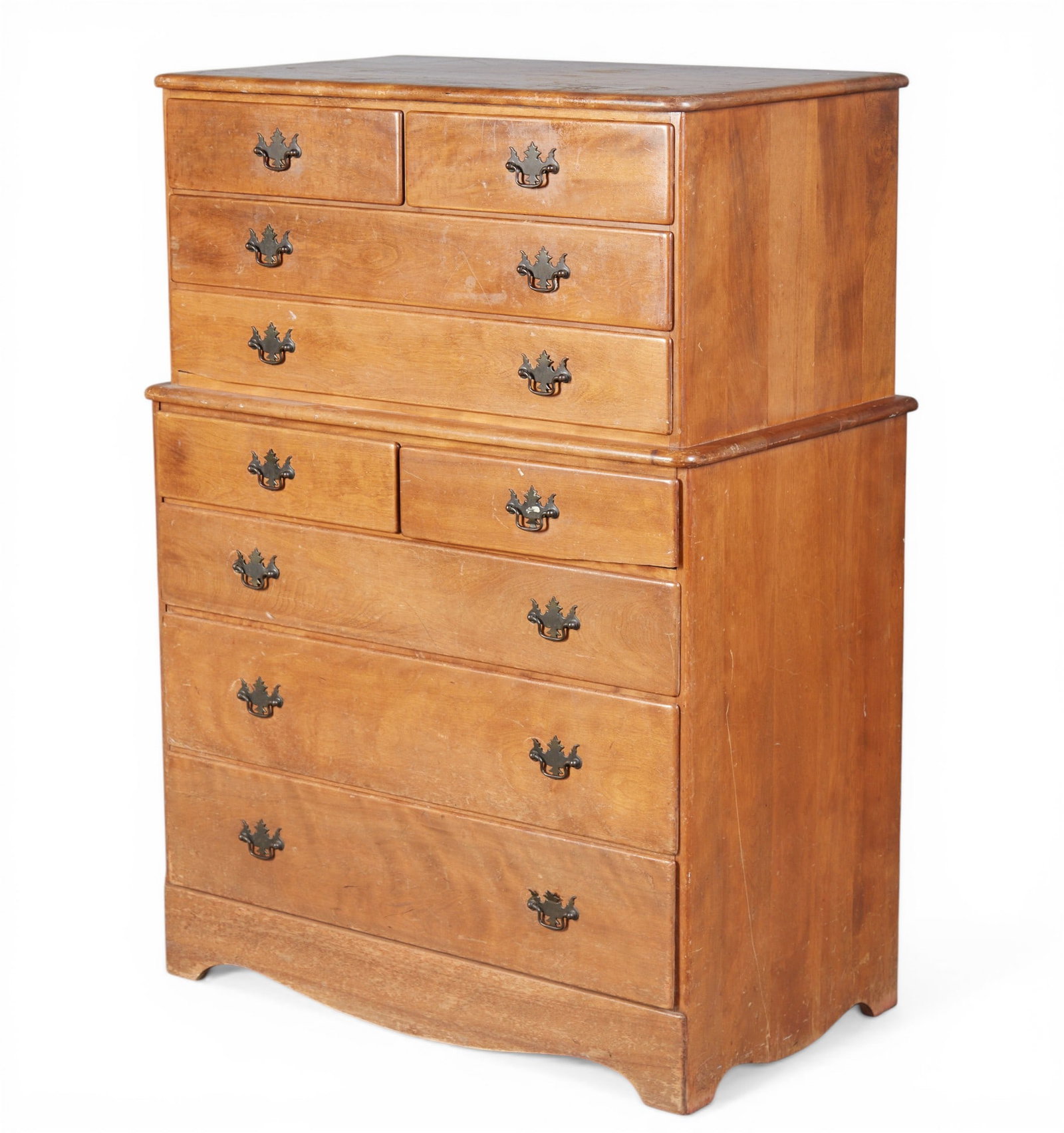 An American Colonial style highboy: An American Colonial style highboy height 49 x width 35 x depth 20 in. (124.5 x 88.9 x 50.8 cm.)