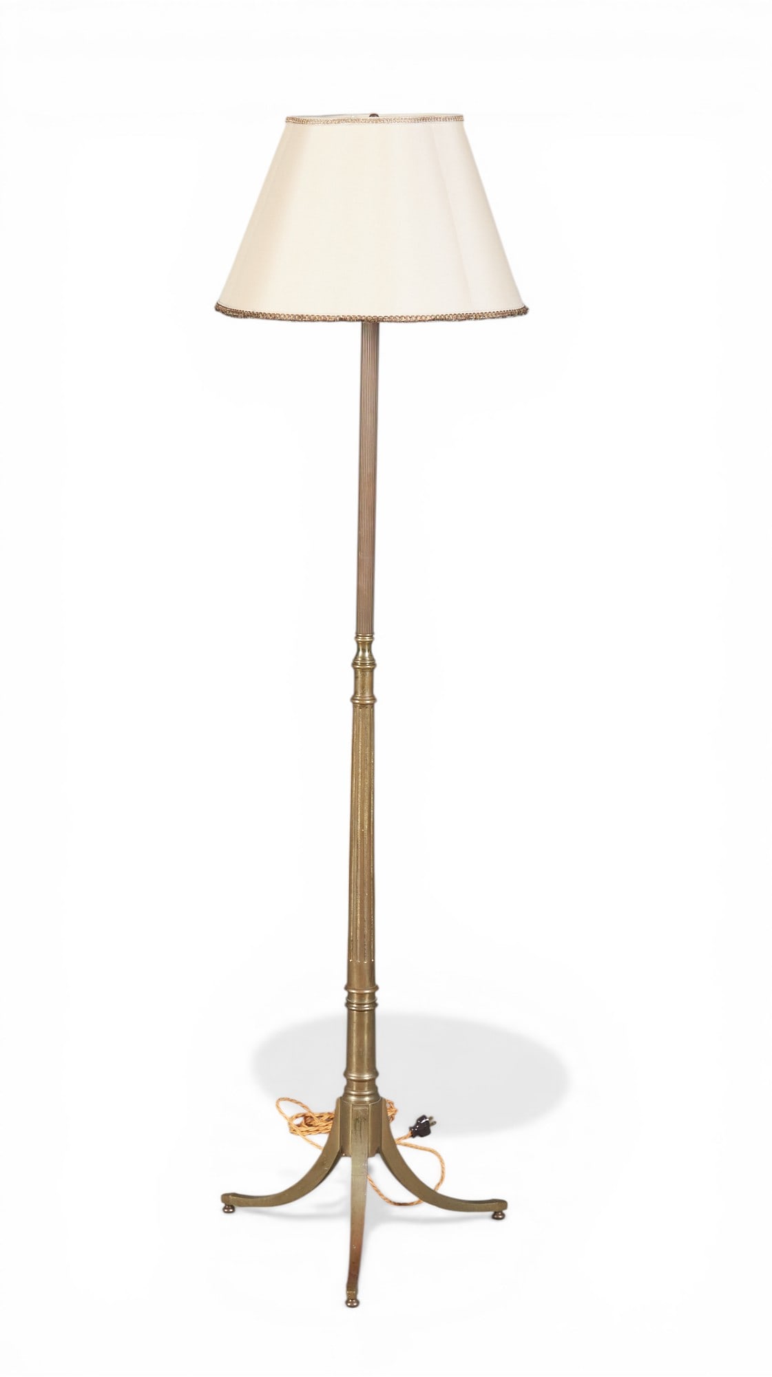 A bronze floor lamp: A bronze floor lamp height 62 in. (157.5 cm.)