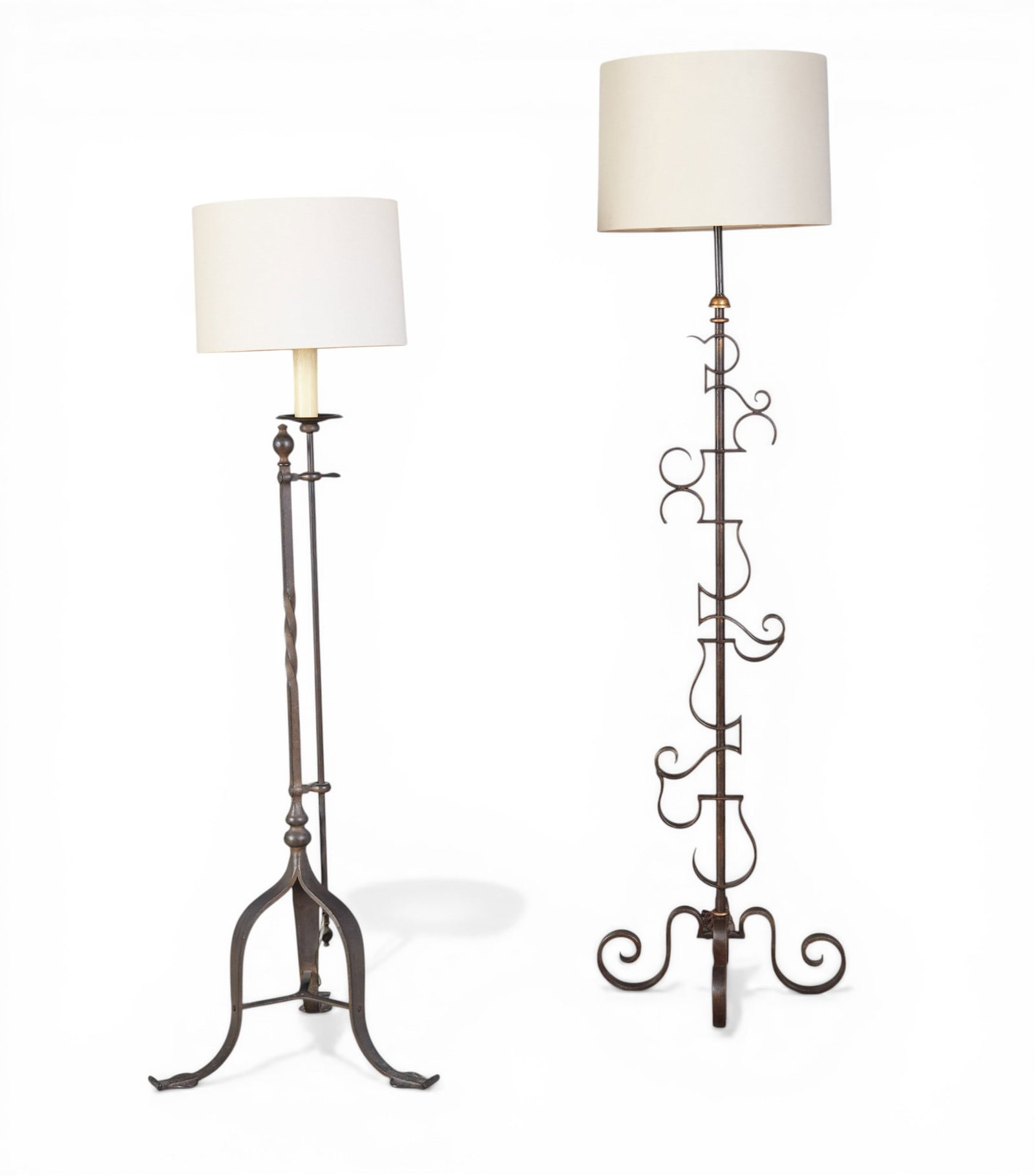 A group of two wrought iron floor lamps (1 of 7)