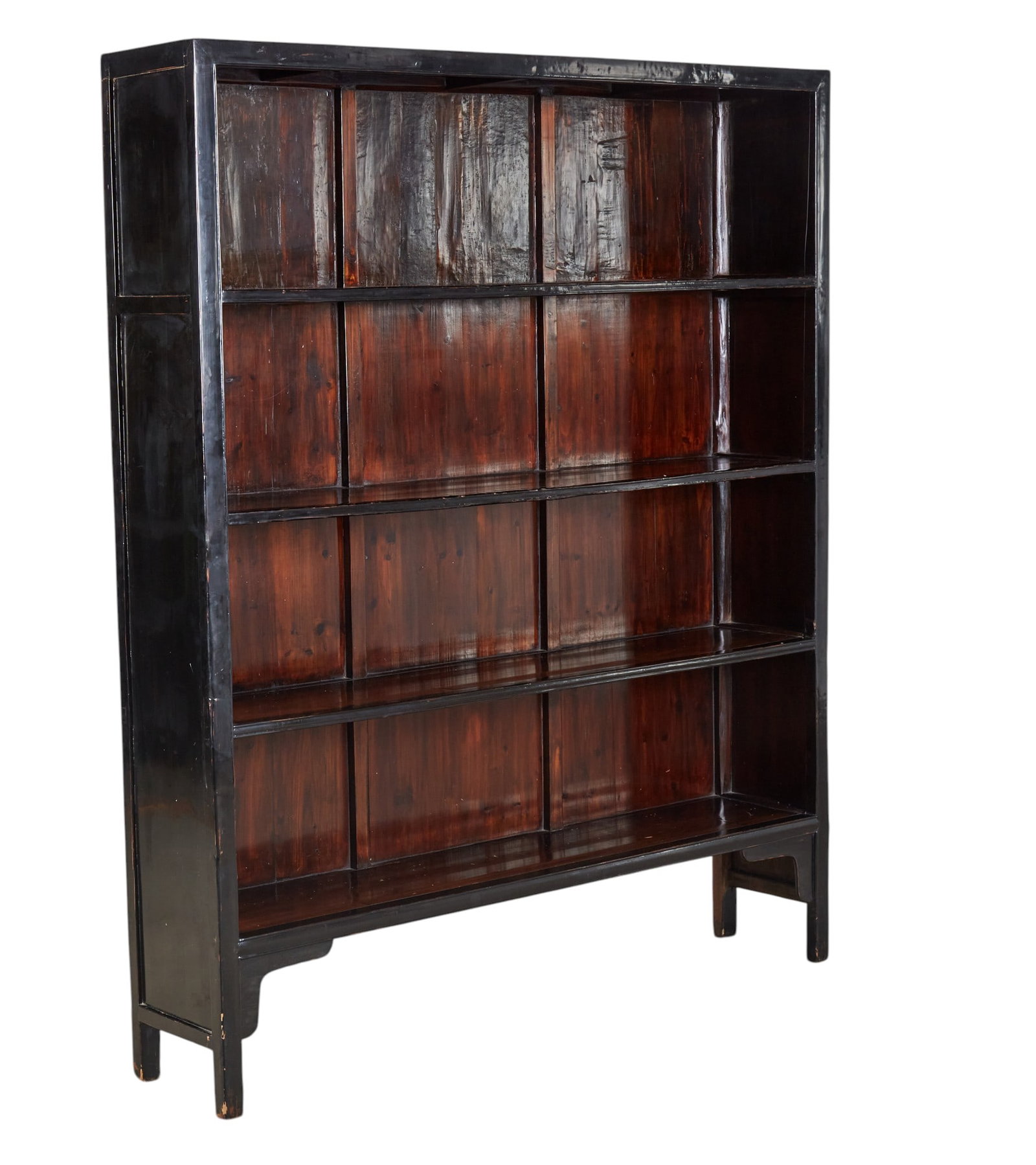 A black lacquered Chinese book case with four shelves: A black lacquered Chinese book case with four shelves height 80 1/2 x width 67 x depth 18 in. (204.5 x 170.2 x 45.7 cm.)