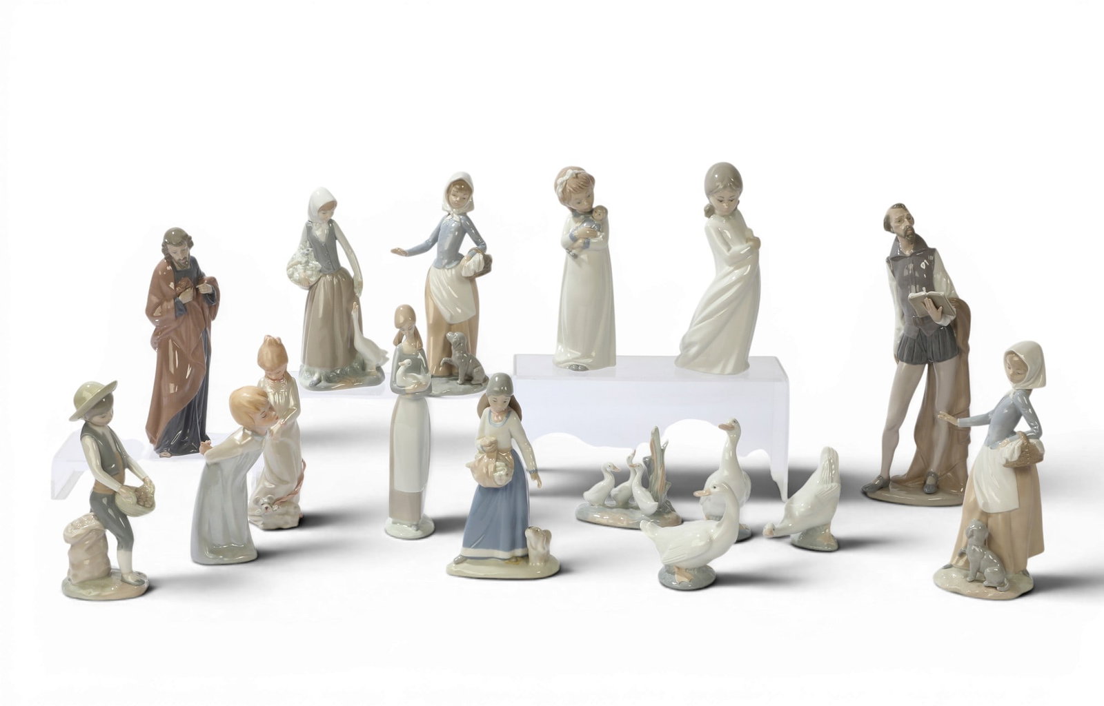 An assembled collection of fourteen Spanish porcelain figures, Nao by Lladro and Zaphir by Lladro, (1 of 12)