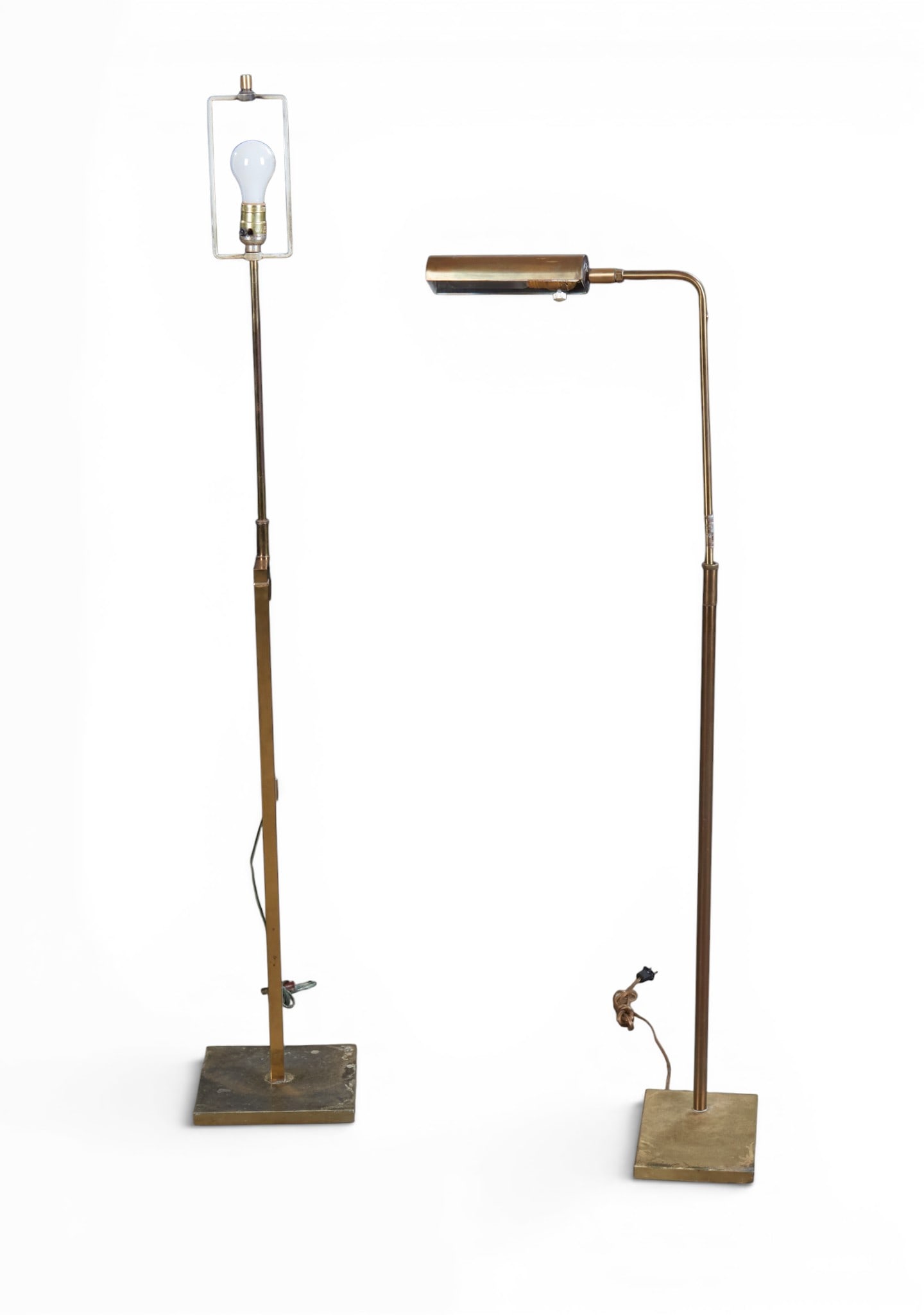 A group of two brass floor lamps: A group of two brass floor lamps Tallest: height 56 in. (142.2 cm.)