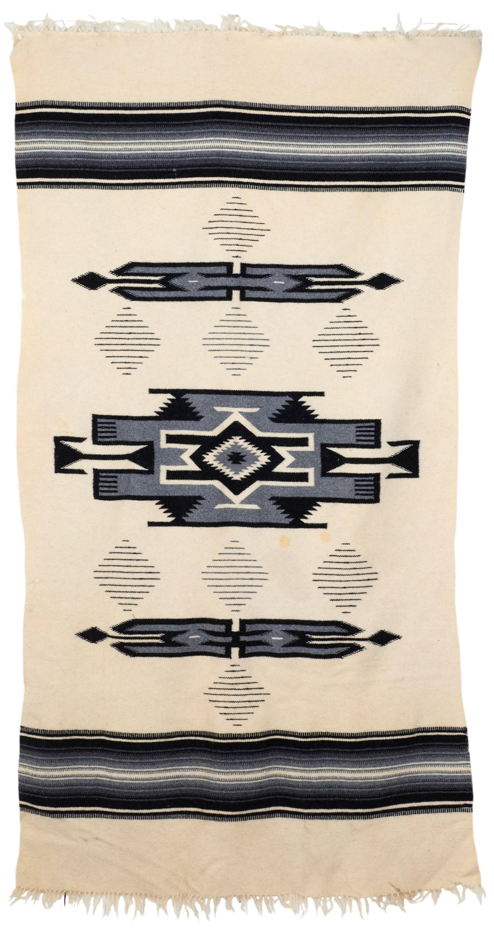 A native American rug: A native American rug 80 x 43 in. (203.2 x 109.2 cm.)