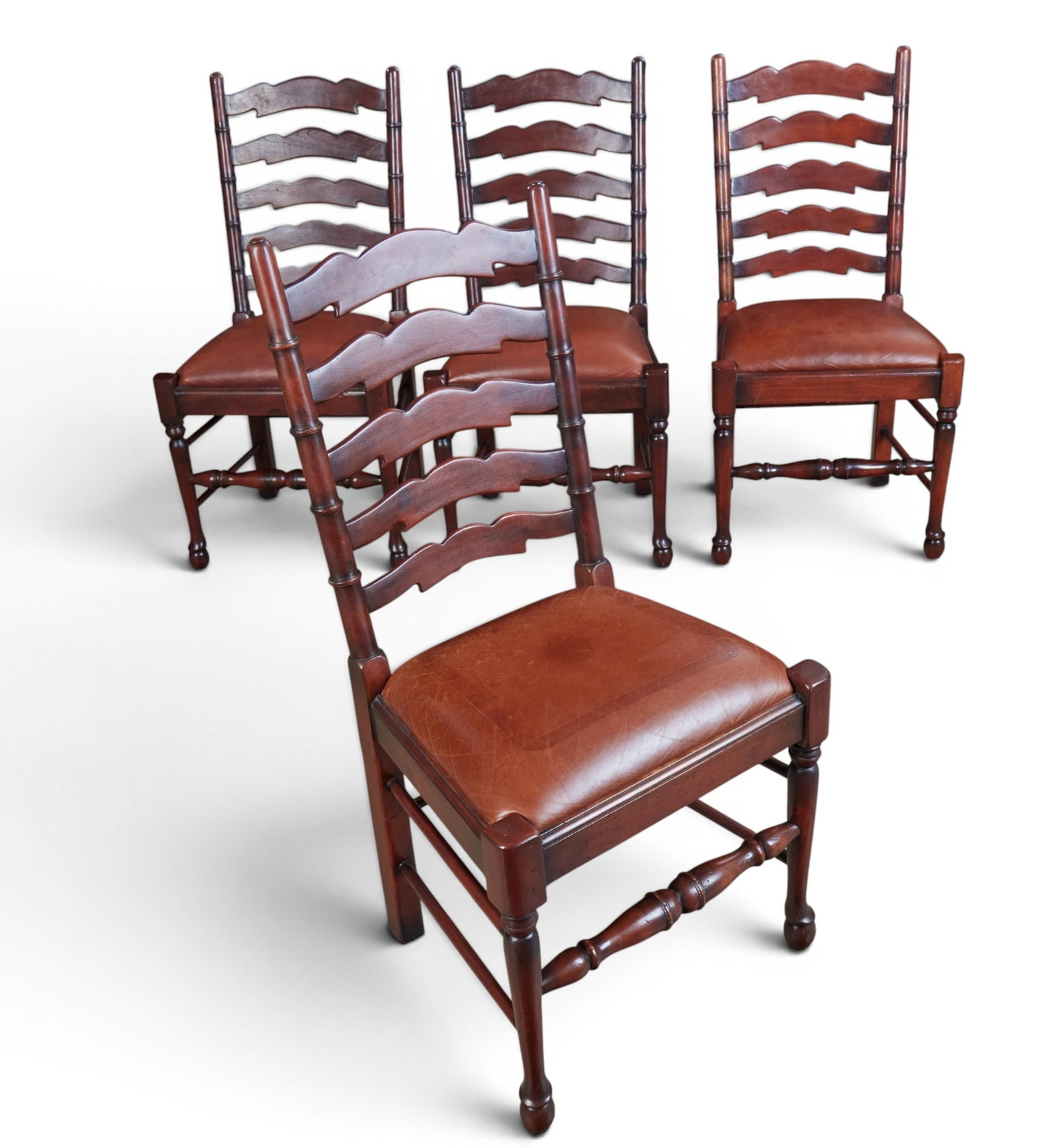 A set of four ladderback upholstered chairs, modern: A set of four ladderback upholstered chairs modern height 42 x width 21 1/2 x depth 23 in. (106.7 x 54.6 x 58.4 cm.)