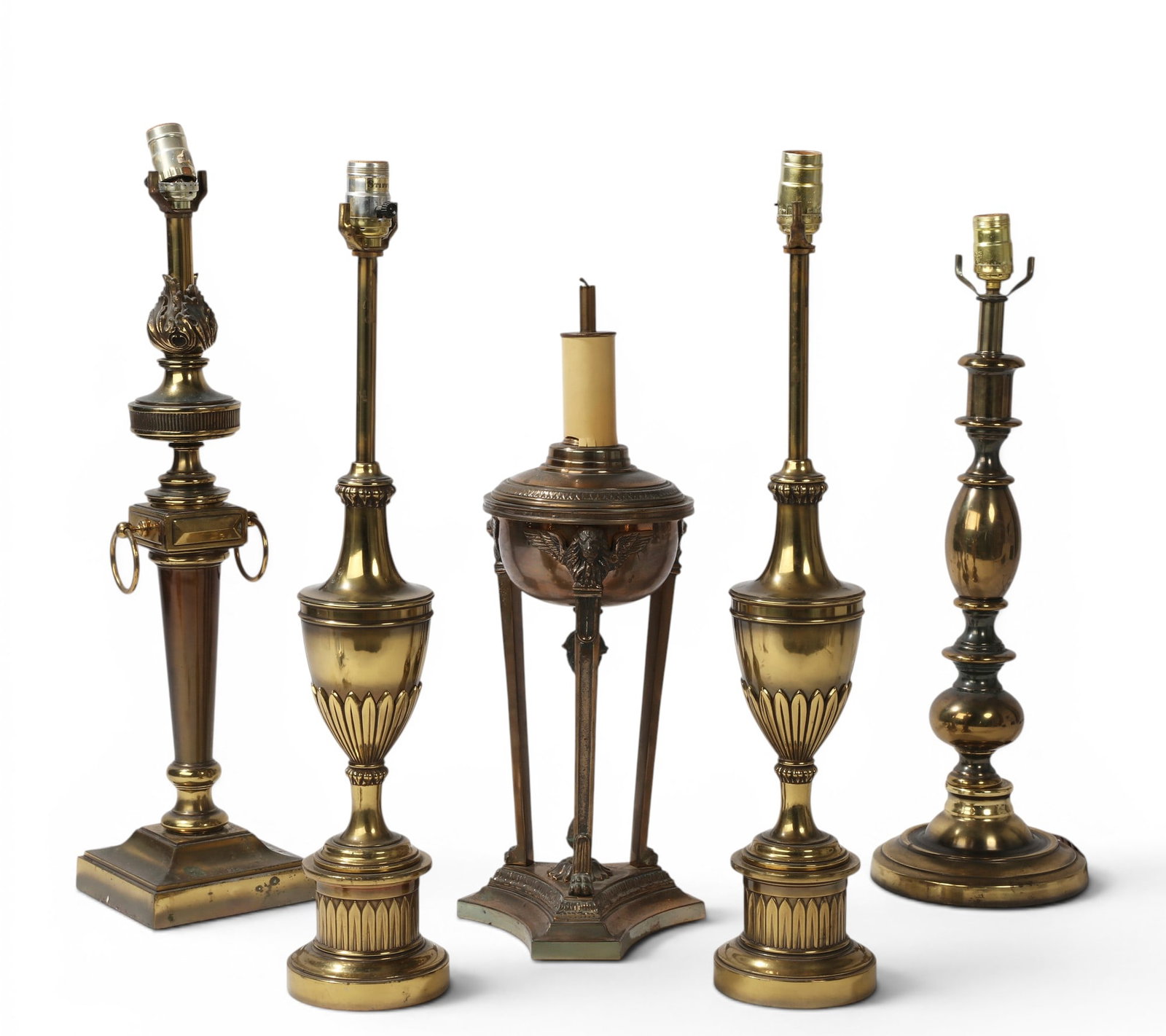 A group of five brass table lamps: A group of five brass table lamps Tallest: height 25 in. (63.5 cm.)