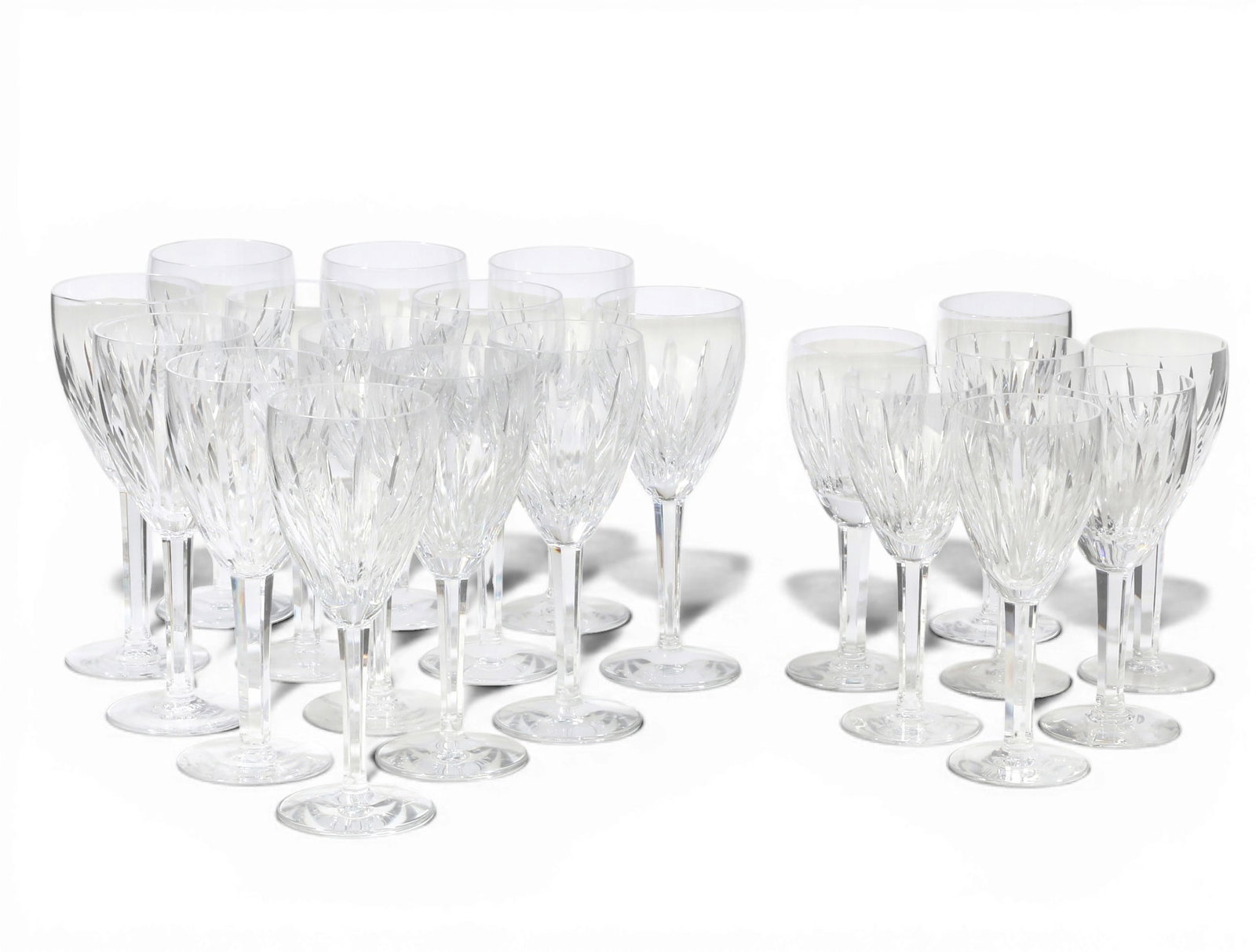 A group of twenty Waterford glasses: A group of twenty Waterford glasses Tallest: height 8 x diameter 3 in. (20.3 x 7.6 cm.)