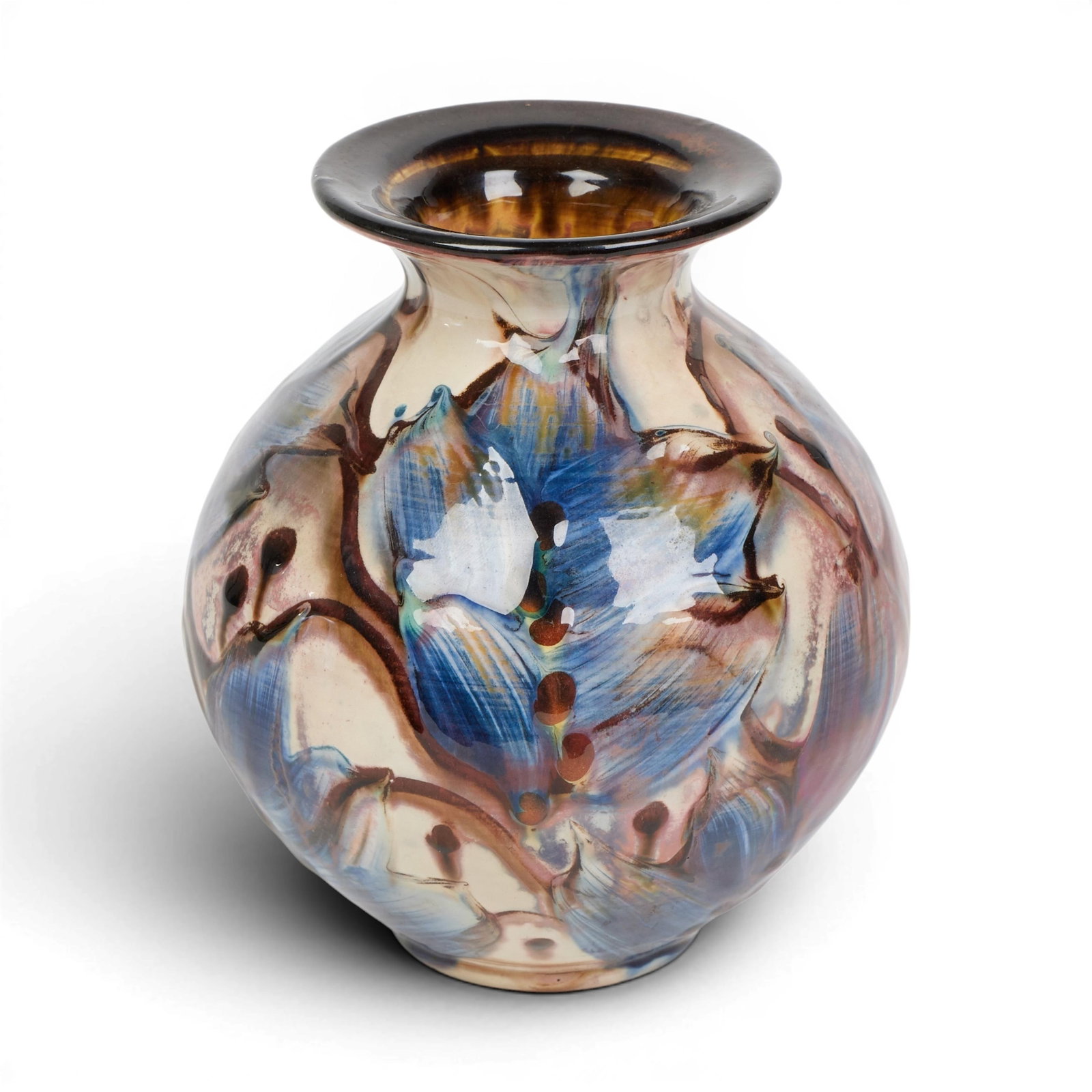 A ceramic vase: A ceramic vase height 6 x diameter 6 in. (15.2 x 15.2 cm.)