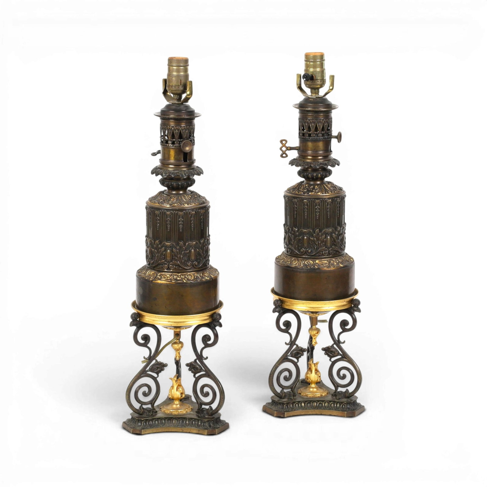 A pair of 19th century French oil lamps converted into table lamps: A pair of 19th century French oil lamps converted into table lamps height 24 in. (61 cm.)