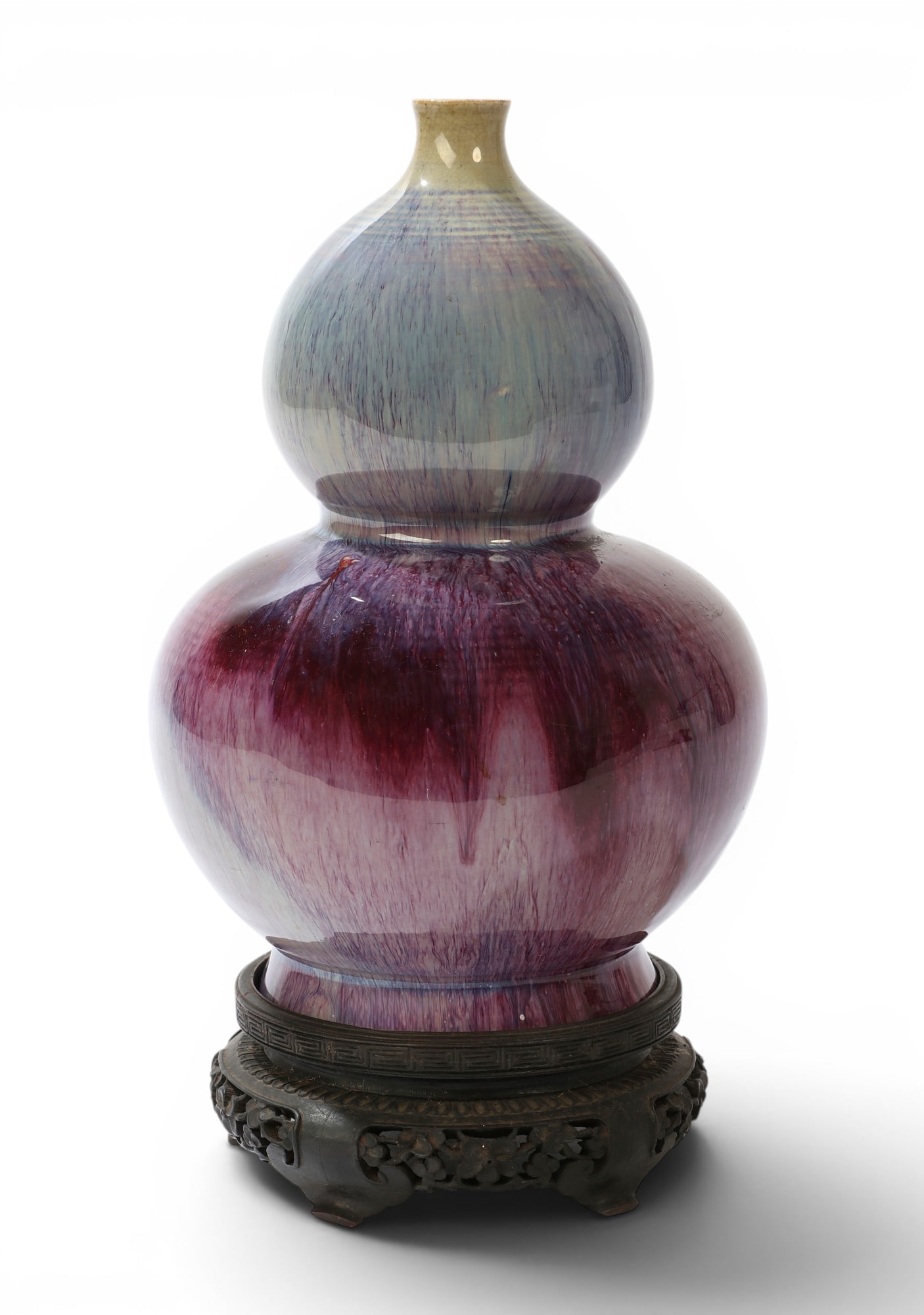A Chinese double gourd vase with purple glaze on wooden stand (1 of 4)