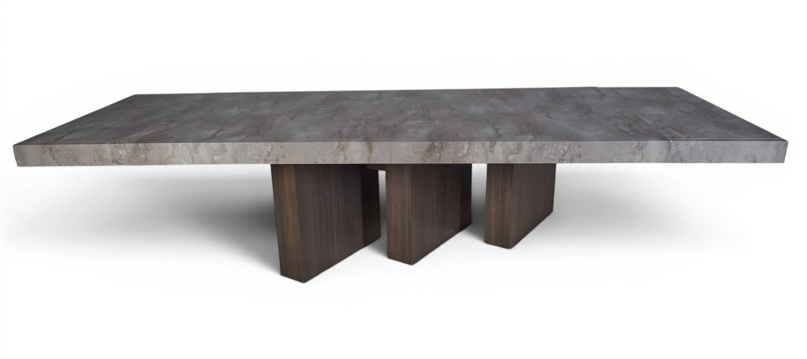 An ebonized dining room table with three column base - 9