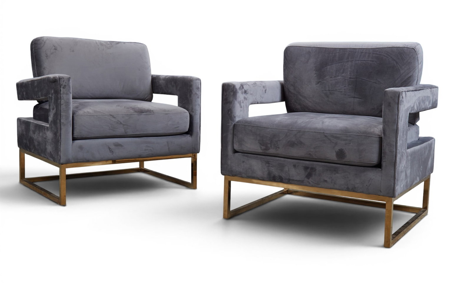A pair of contemporary arm chairs: A pair of contemporary arm chairs Height 36in; width 34in, depth of seat 21in