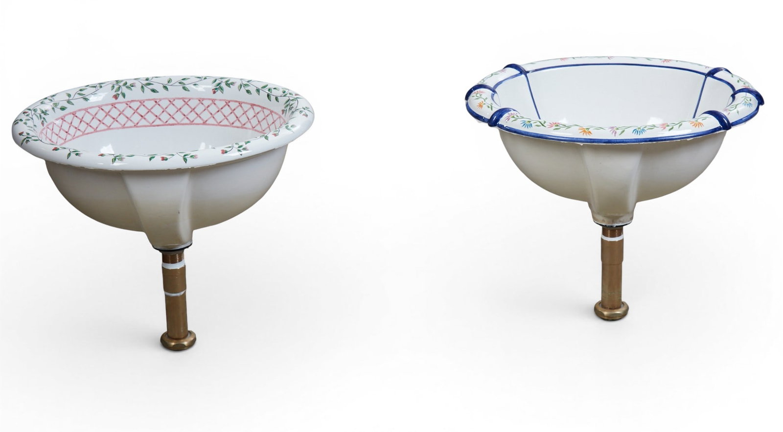 A group of two ceramic painted sinks: A group of two ceramic painted sinks height 9 x width 17 x depth 14 in. (22.9 x 43.2 x 35.6 cm.)