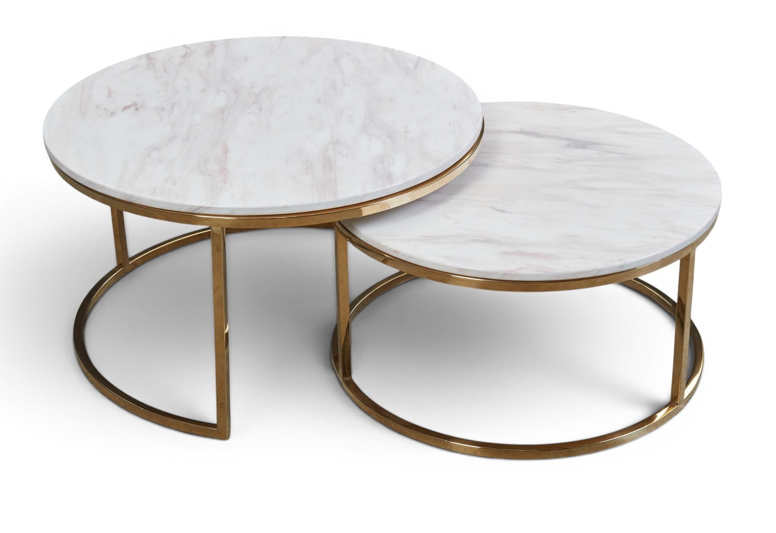 A pair of Modern marble nesting coffee tables: A pair of Modern marble nesting coffee tables Height of largest 17 1/2; Diameter of largest 32in