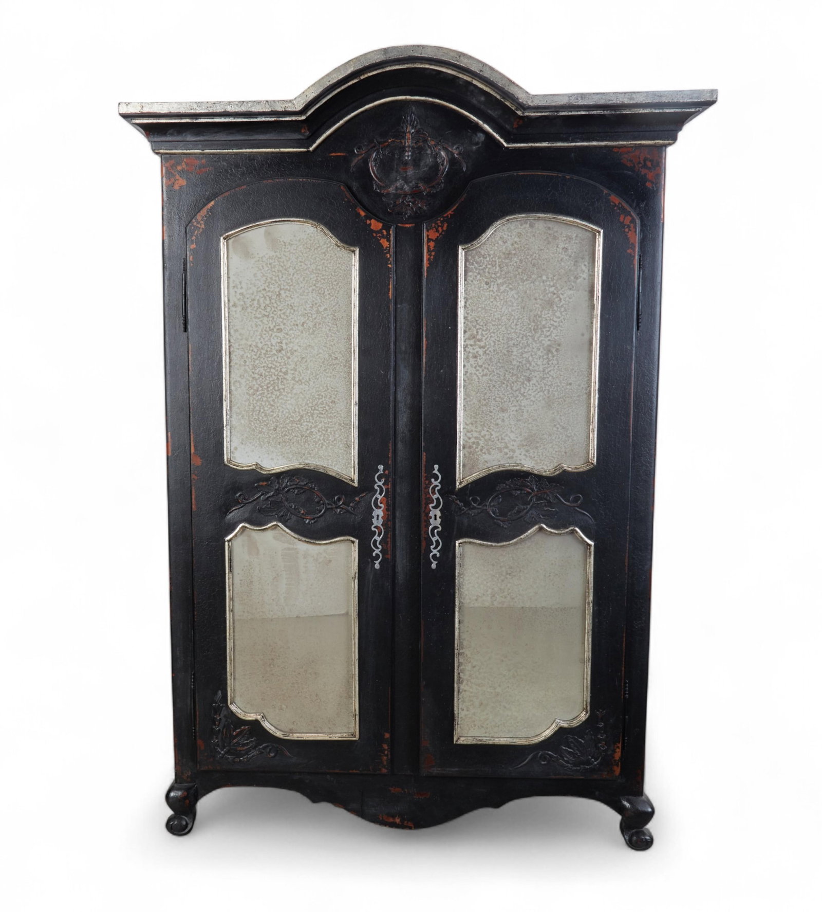 A Louis XV Provincial style parcel silvered ebonized mirror paneled armoire, modern: A Louis XV Provincial style parcel silvered ebonized mirror paneled armoire modern height 89in (226cm); width 63in (160cm); depth 28in (71cm) .