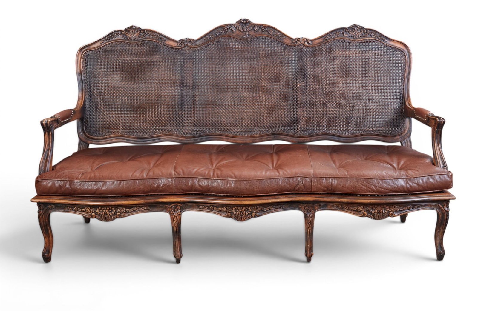 A cane back settee - 2