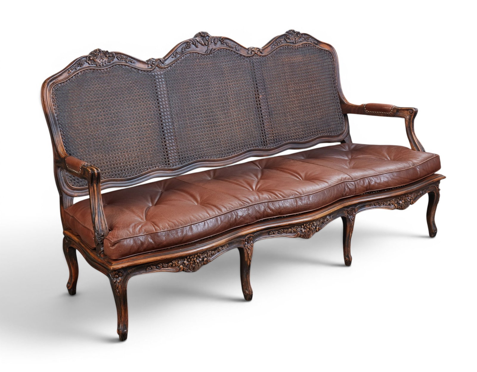 A cane back settee - 5