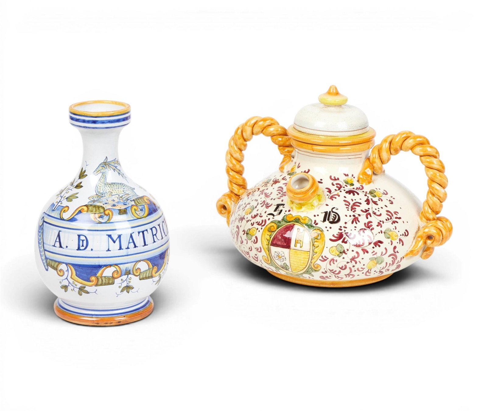 An Italian Majolica glazed jug and apothecary jar, modern: An Italian Majolica glazed jug and apothecary jar modern height of jar 9 3/4in (25cm); width of teapot 13in (33cm)