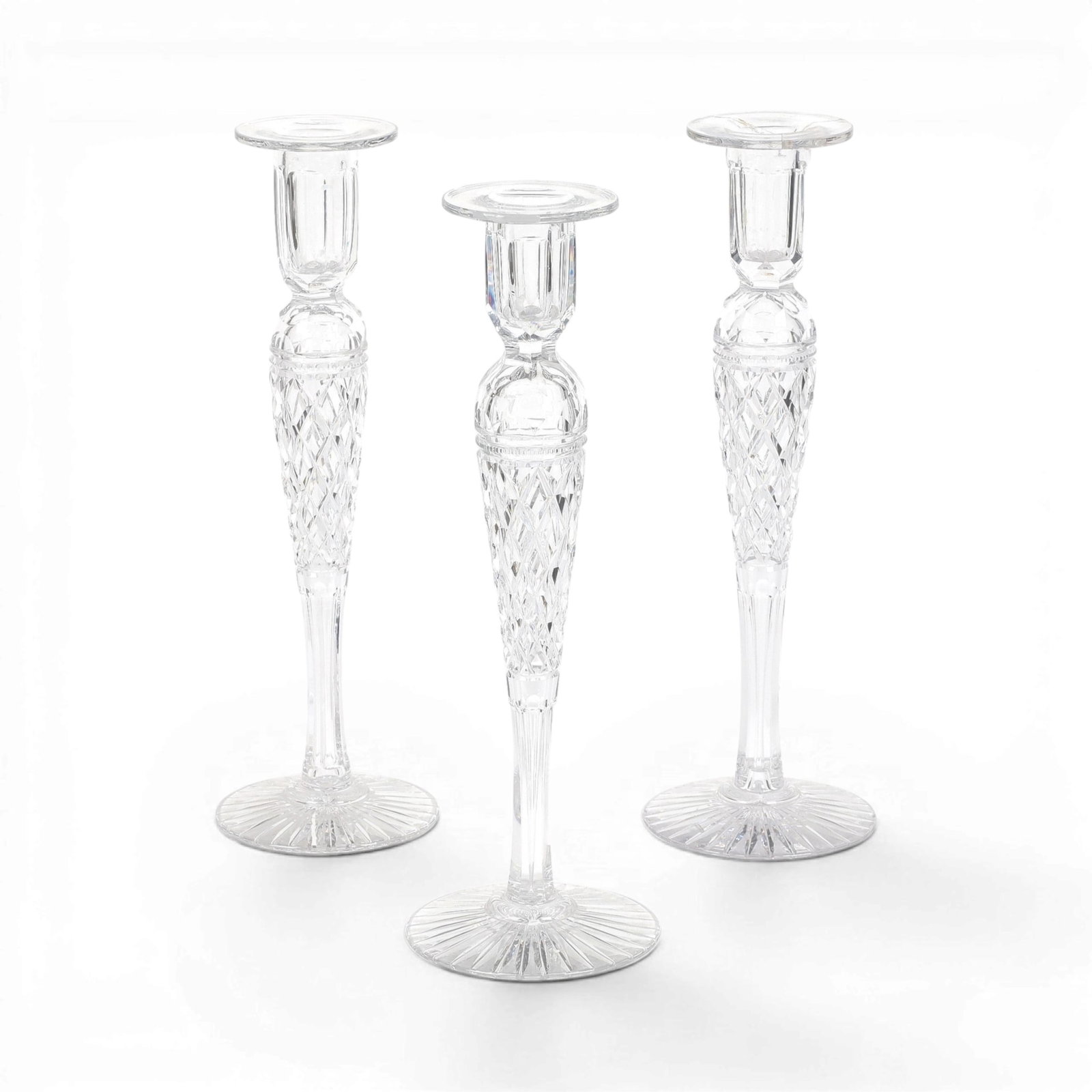 A group of three American brilliant cut candle sticks: A group of three American brilliant cut candle sticks one as is height 14 in. (35.6 cm.)